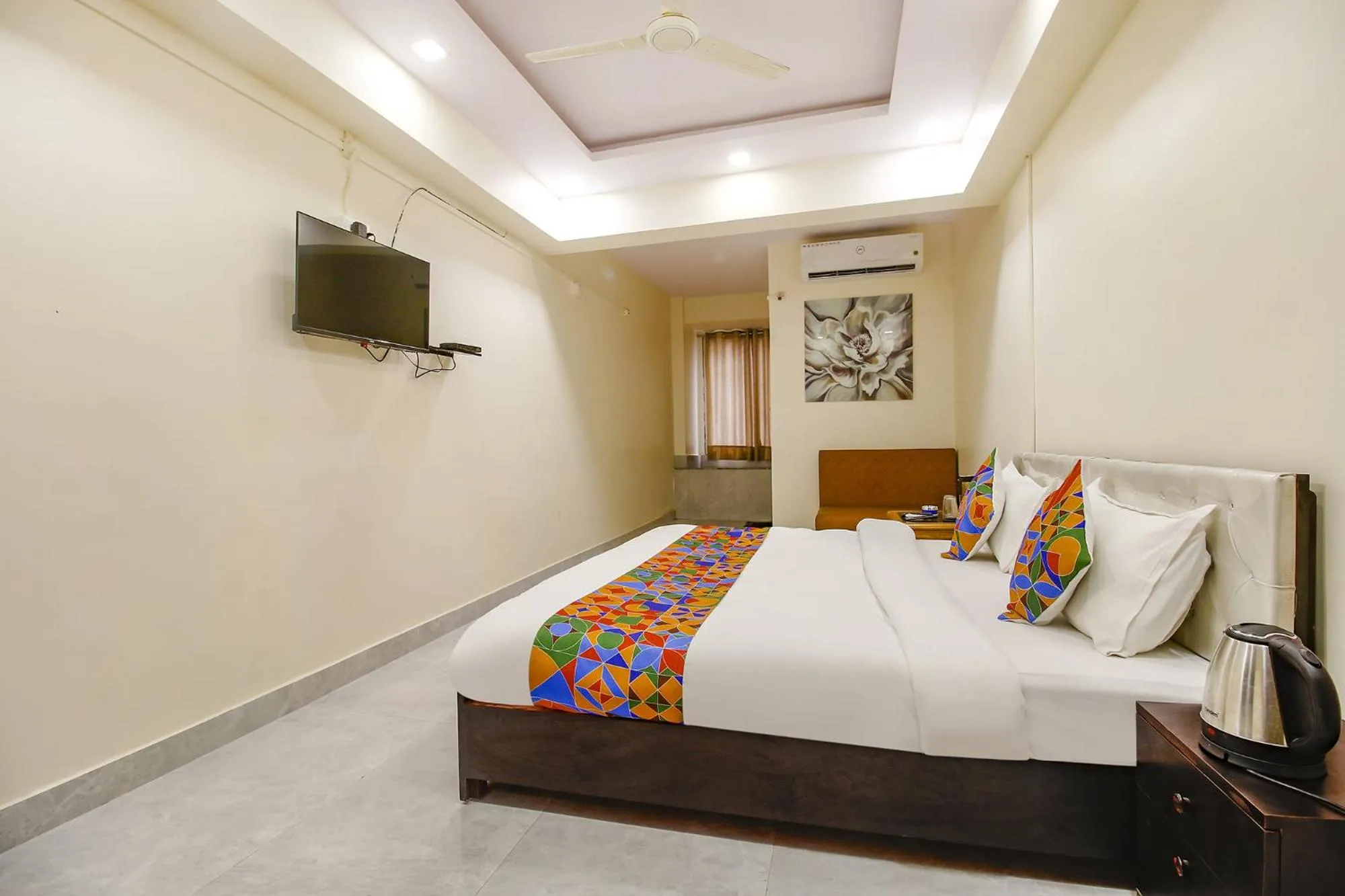 Bed in FabHotel Sanskar
