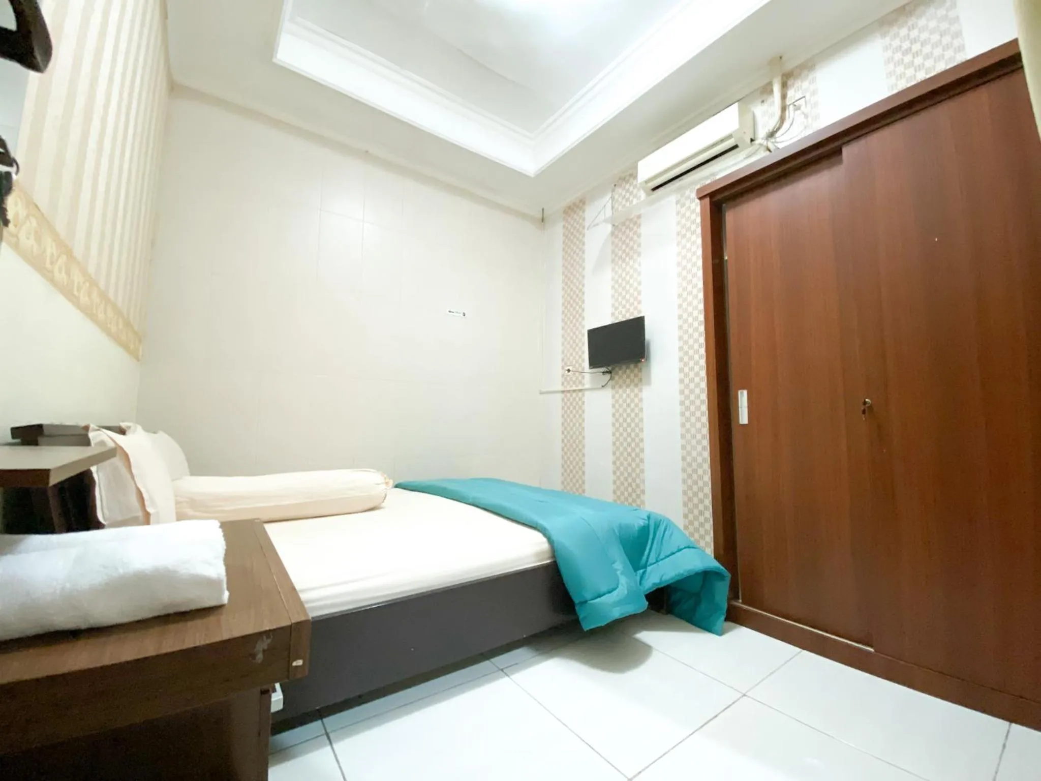 Bedroom in Homey Guesthouse near Sby Zoo Syariah