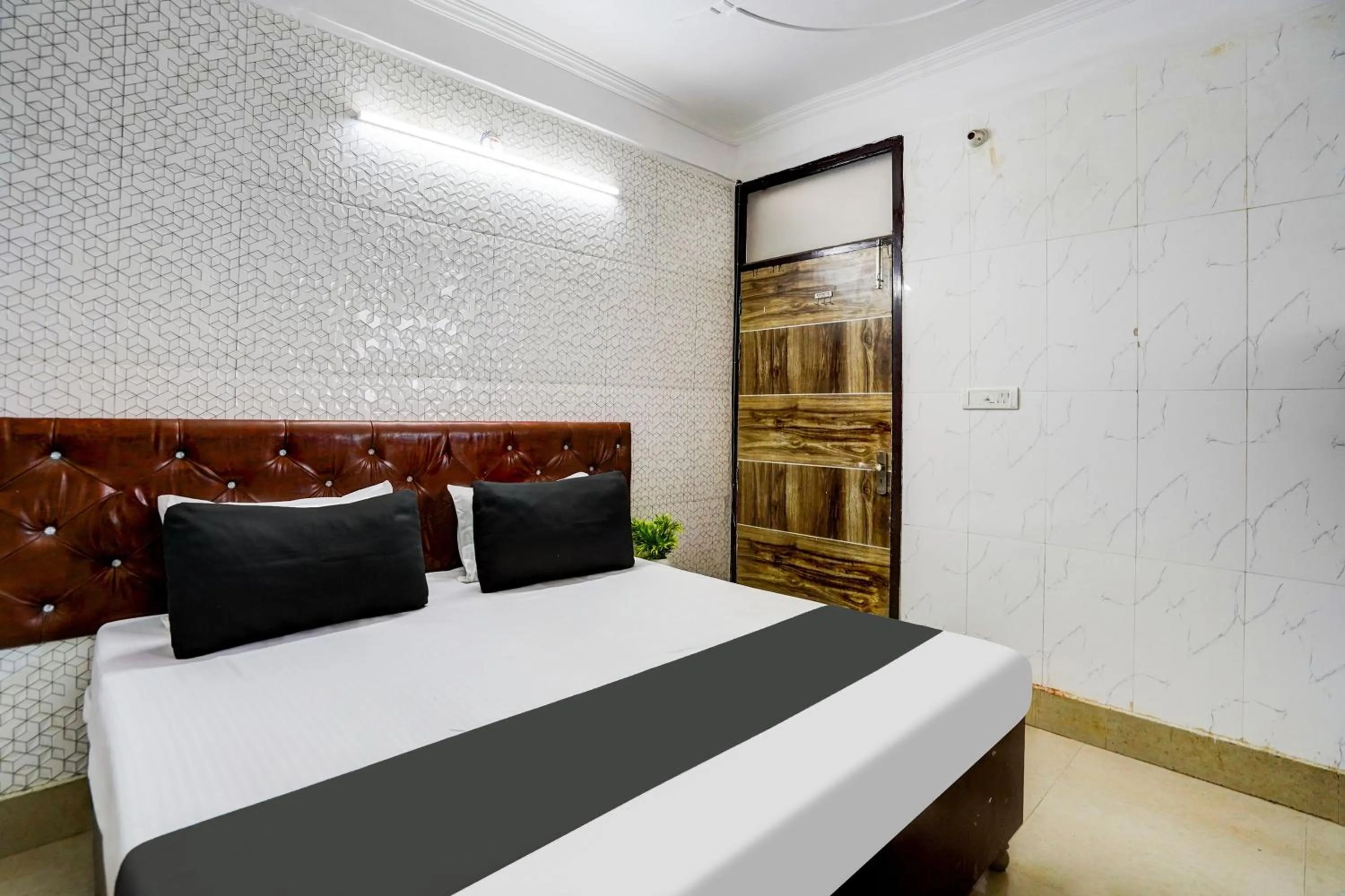 Bedroom, Bed in Super Hotel O The Maruti hotel