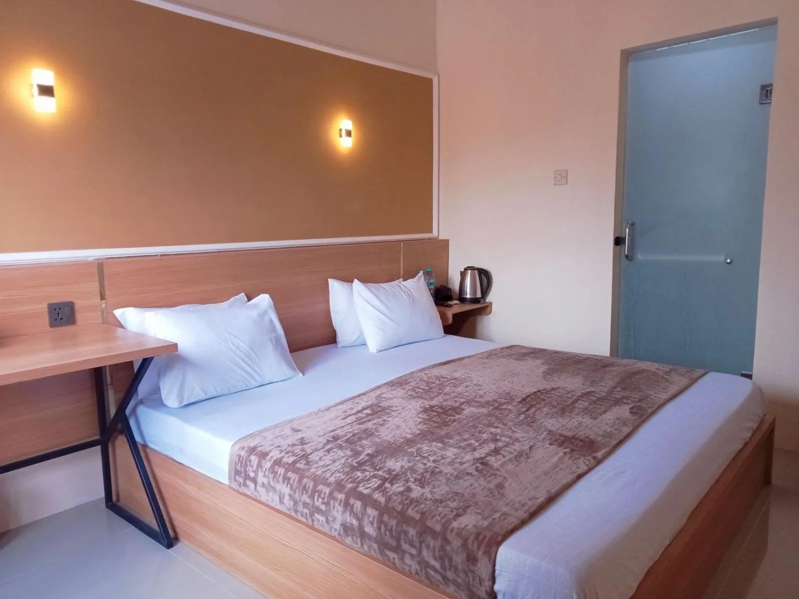 Bed in Al-Kiswah Syariah Guest House