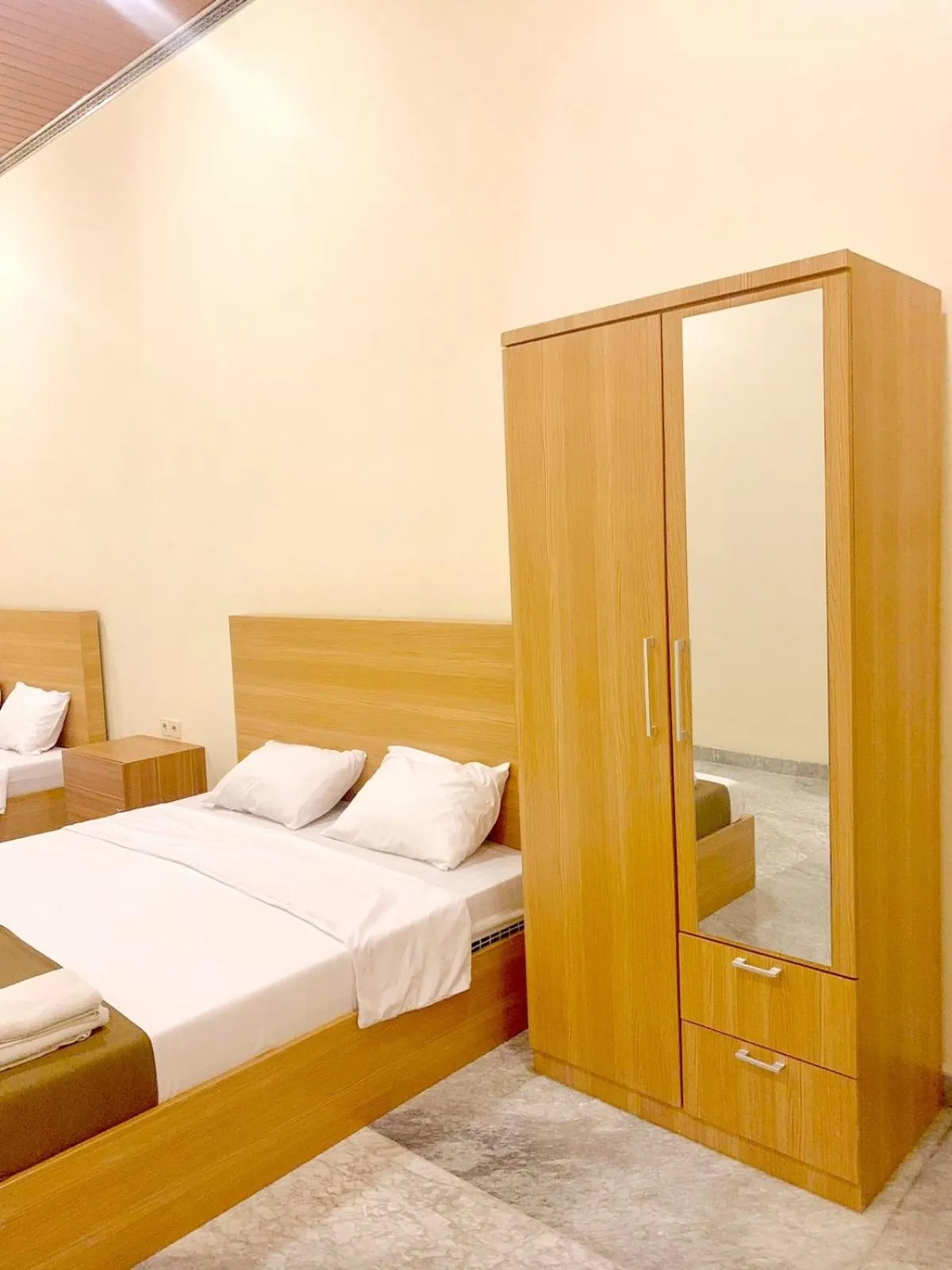 Bed in Al-Kiswah Syariah Guest House