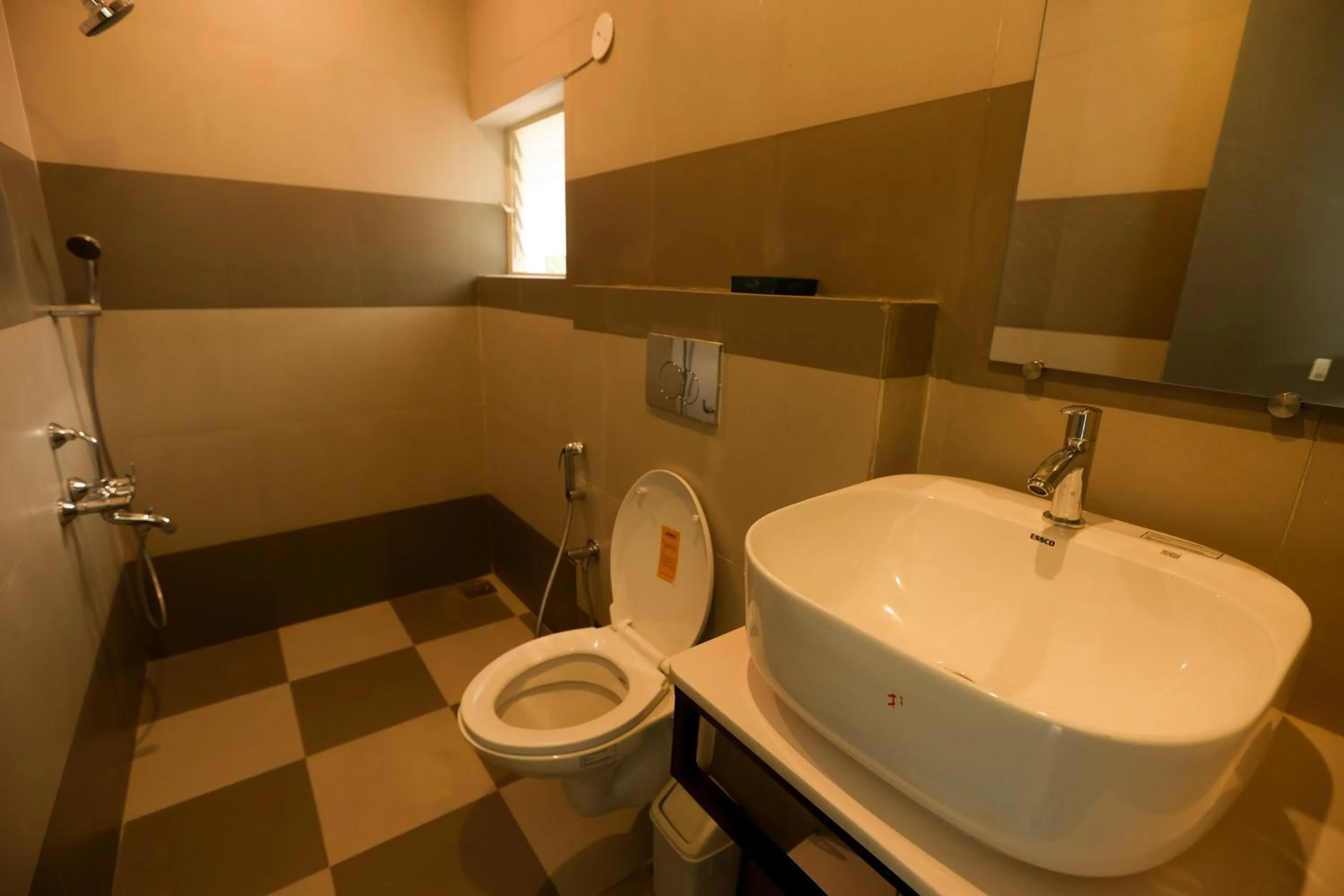 Bathroom in Coastal Pearl Hotel Miramar Panaji