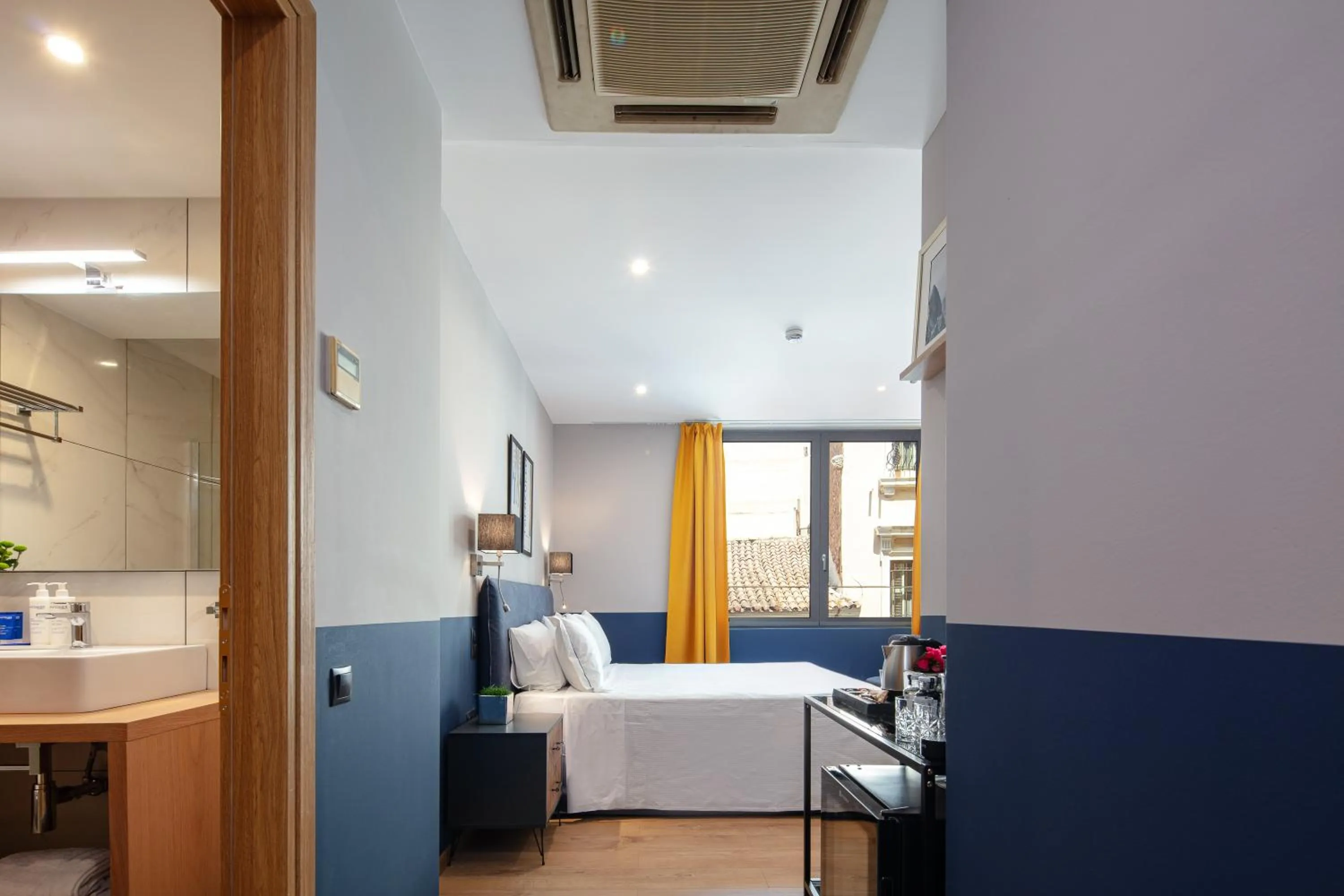 Photo of the whole room, Bed in The Vault Athens