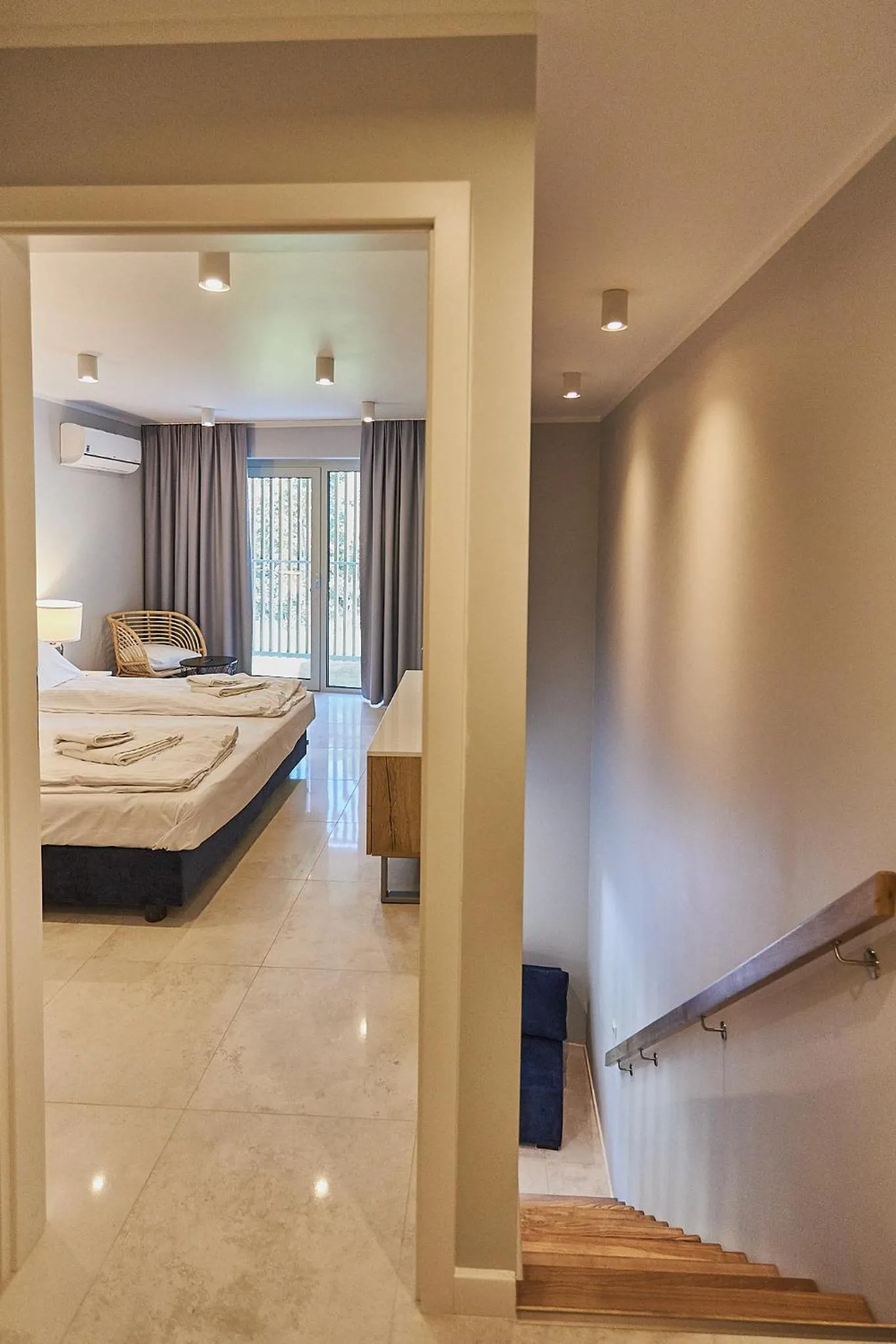 Bed in Timber Apartments by Baltic Home