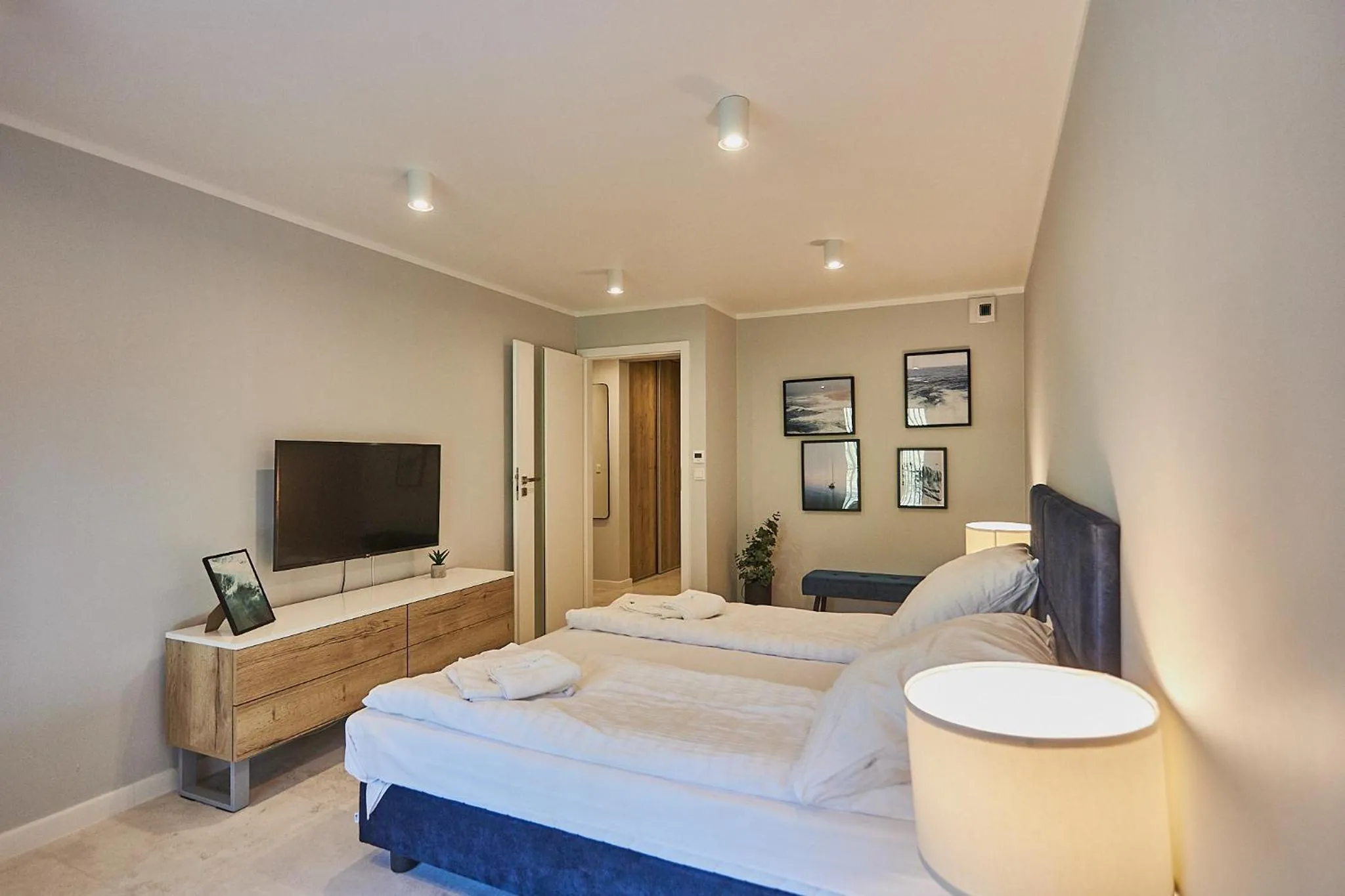 TV and multimedia, Bed in Timber Apartments by Baltic Home