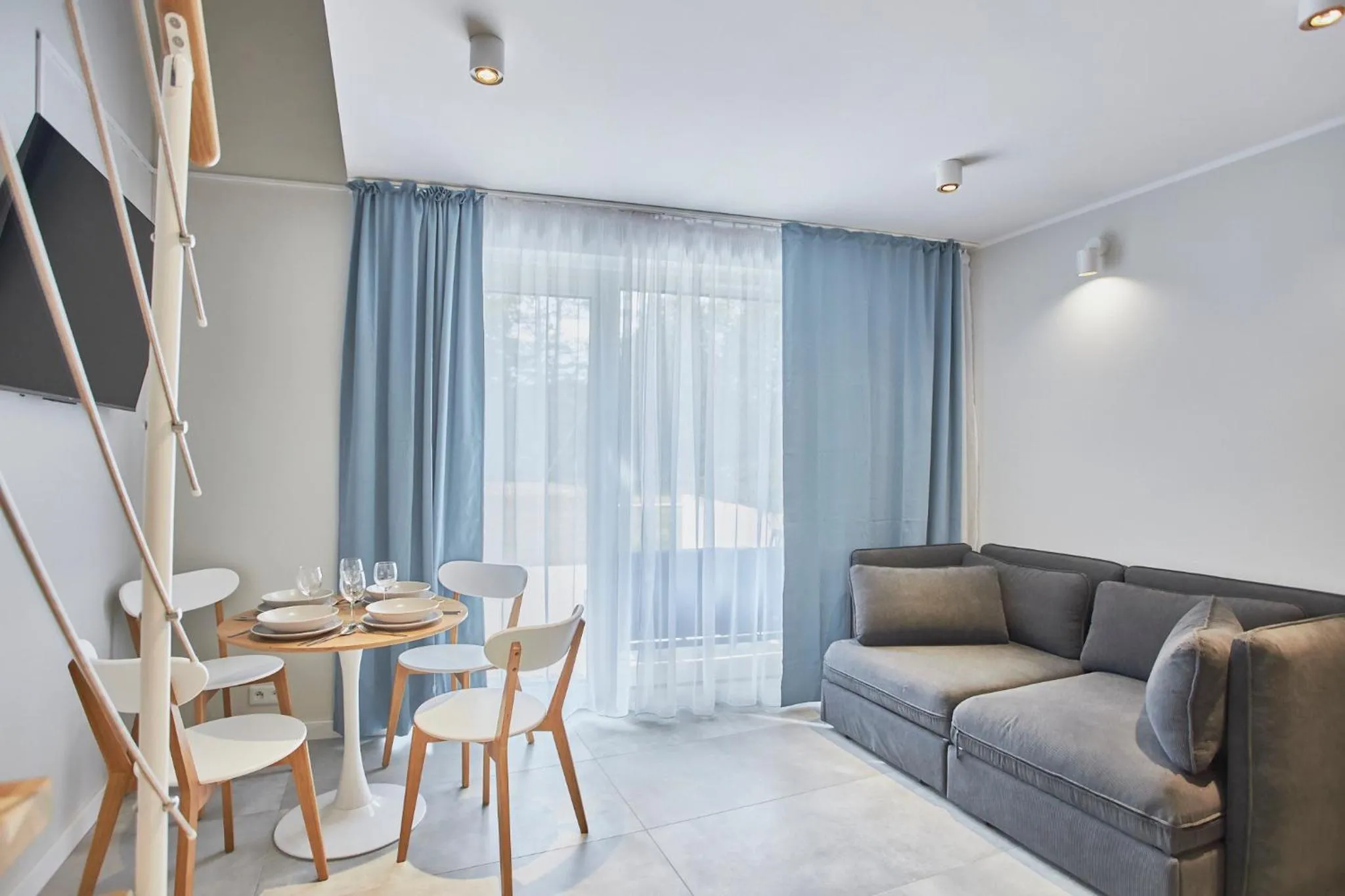 TV and multimedia in Timber Apartments by Baltic Home