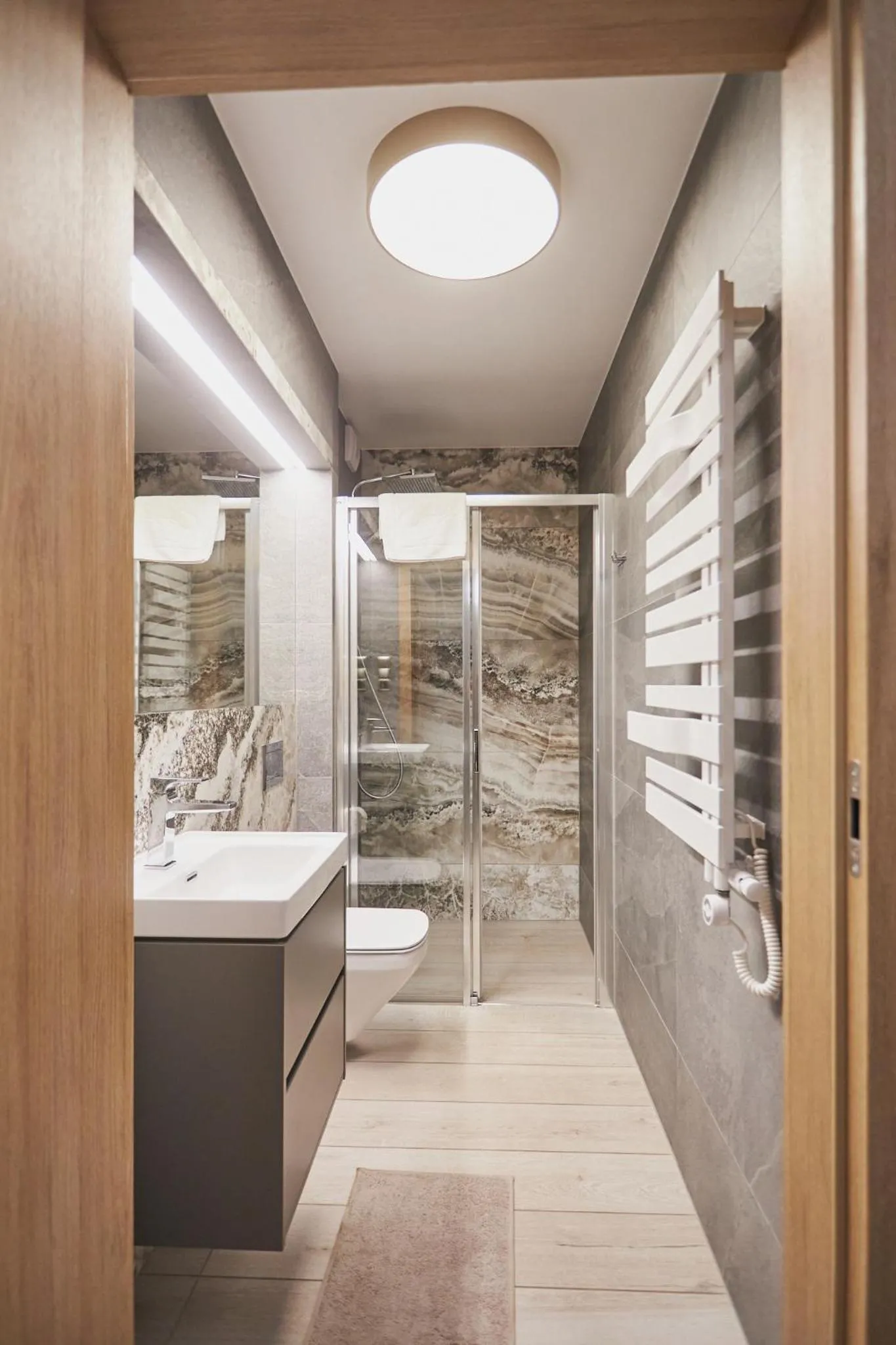 Shower in Timber Apartments by Baltic Home
