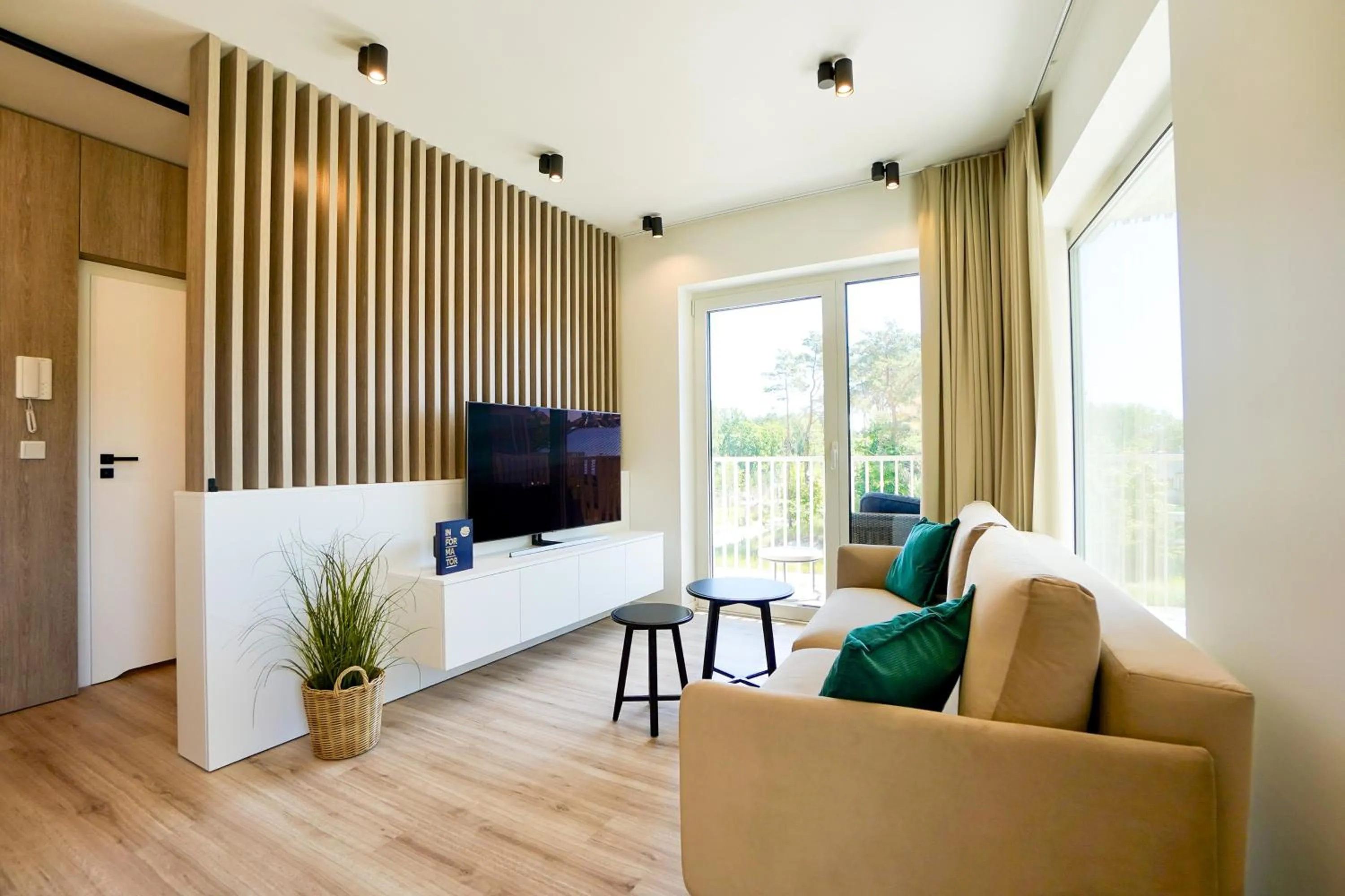 Communal lounge/ TV room in Timber Apartments by Baltic Home
