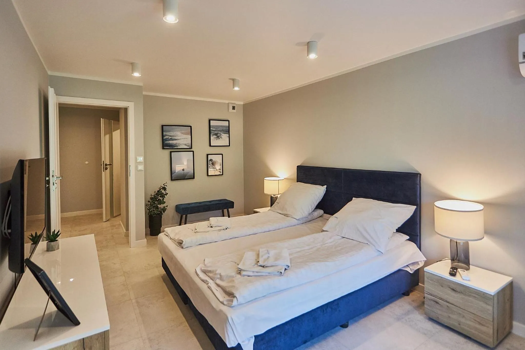 Bed in Timber Apartments by Baltic Home