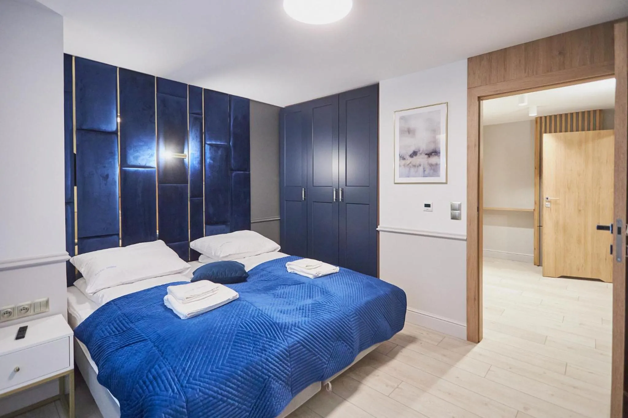 Bed in Timber Apartments by Baltic Home