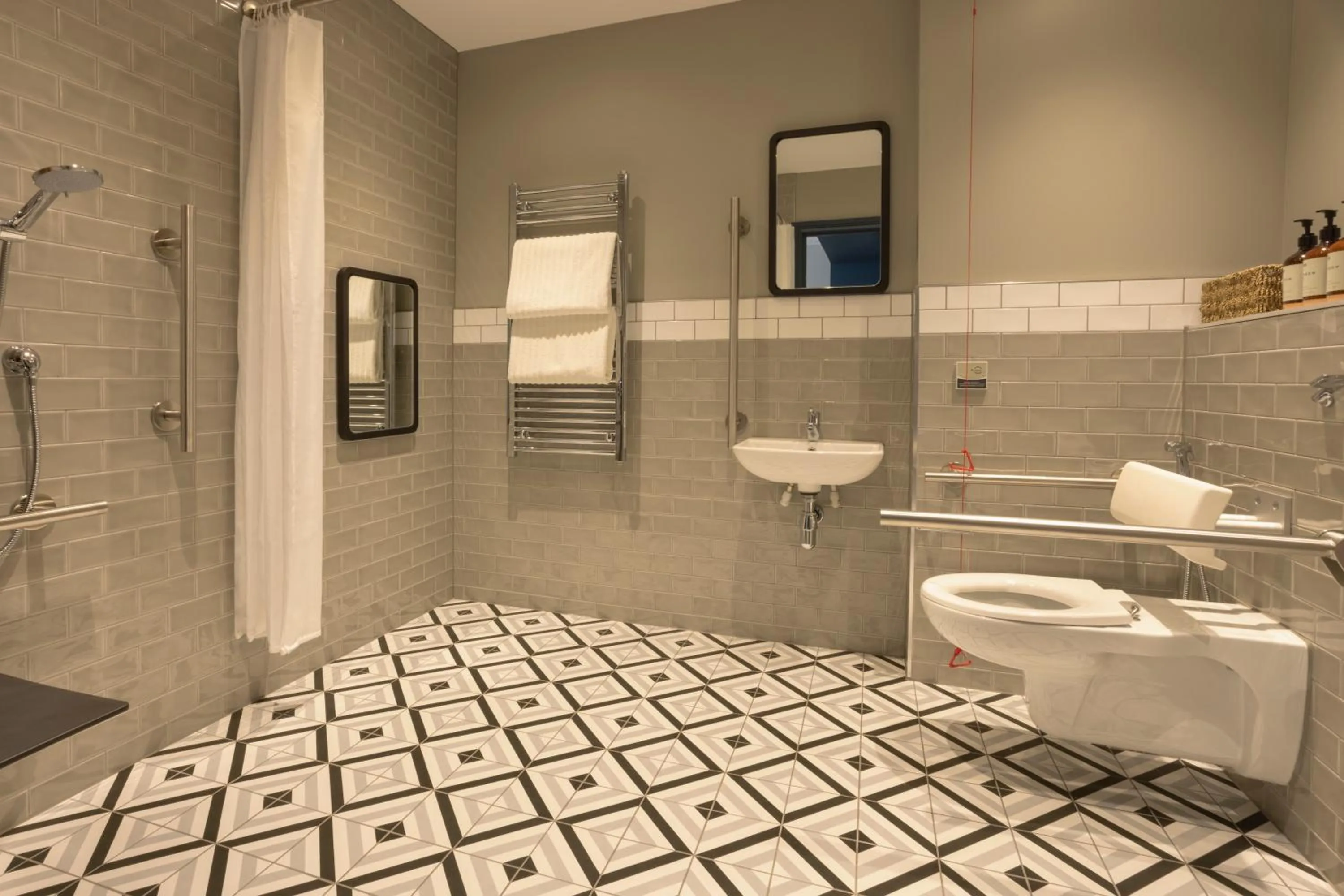 Bathroom in The 55 by Le Mirage