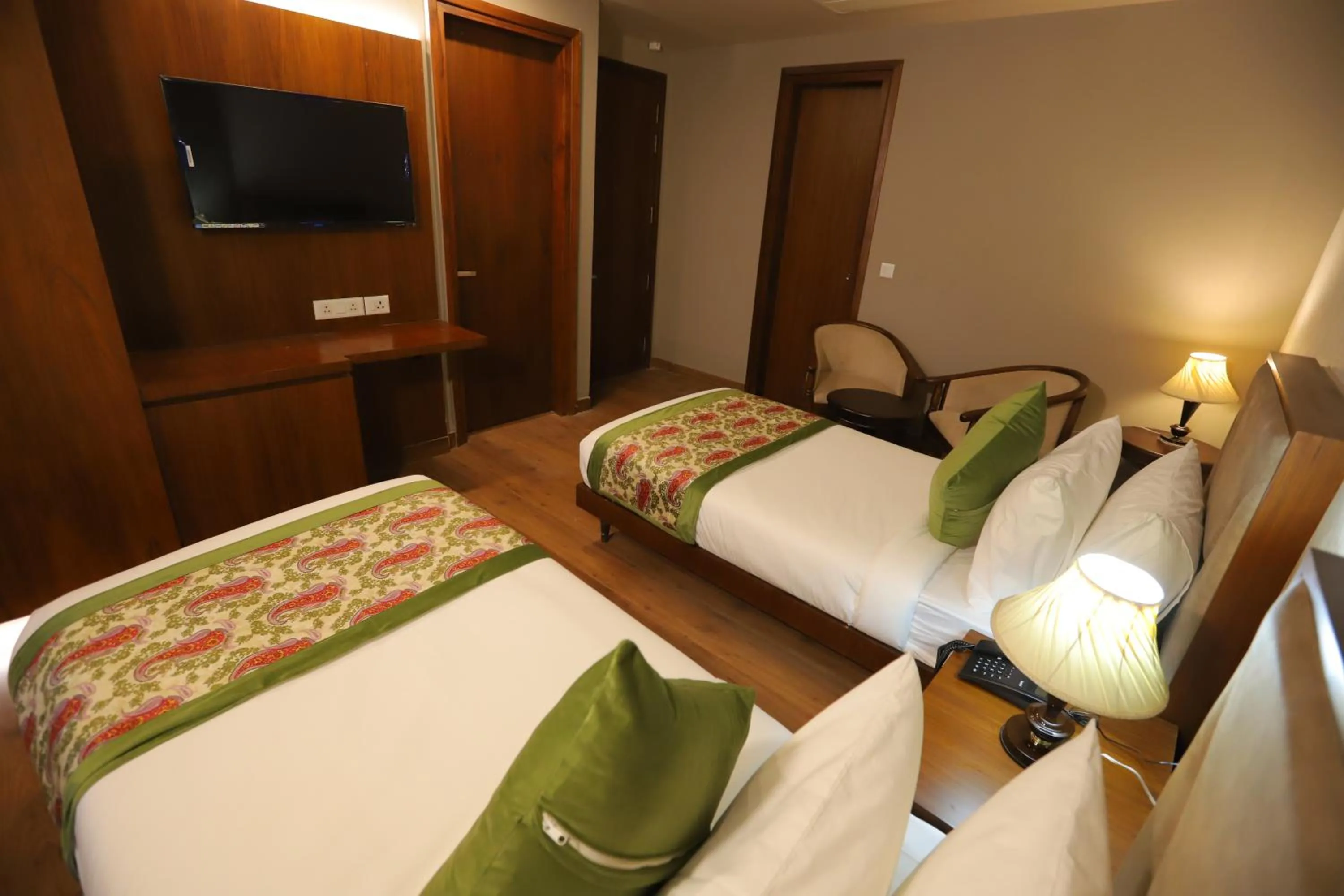 Communal lounge/ TV room, Bed in IP Royal Hotel - New Delhi