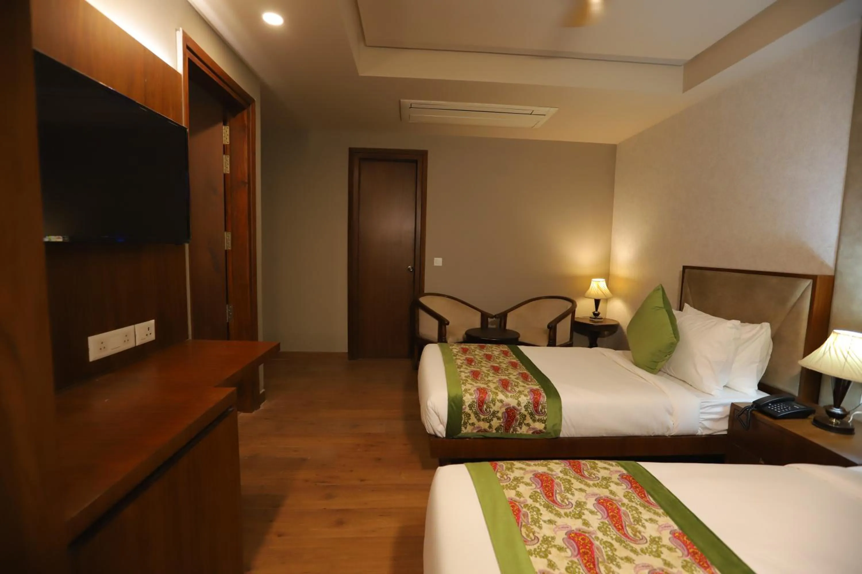 Communal lounge/ TV room, Bed in IP Royal Hotel - New Delhi