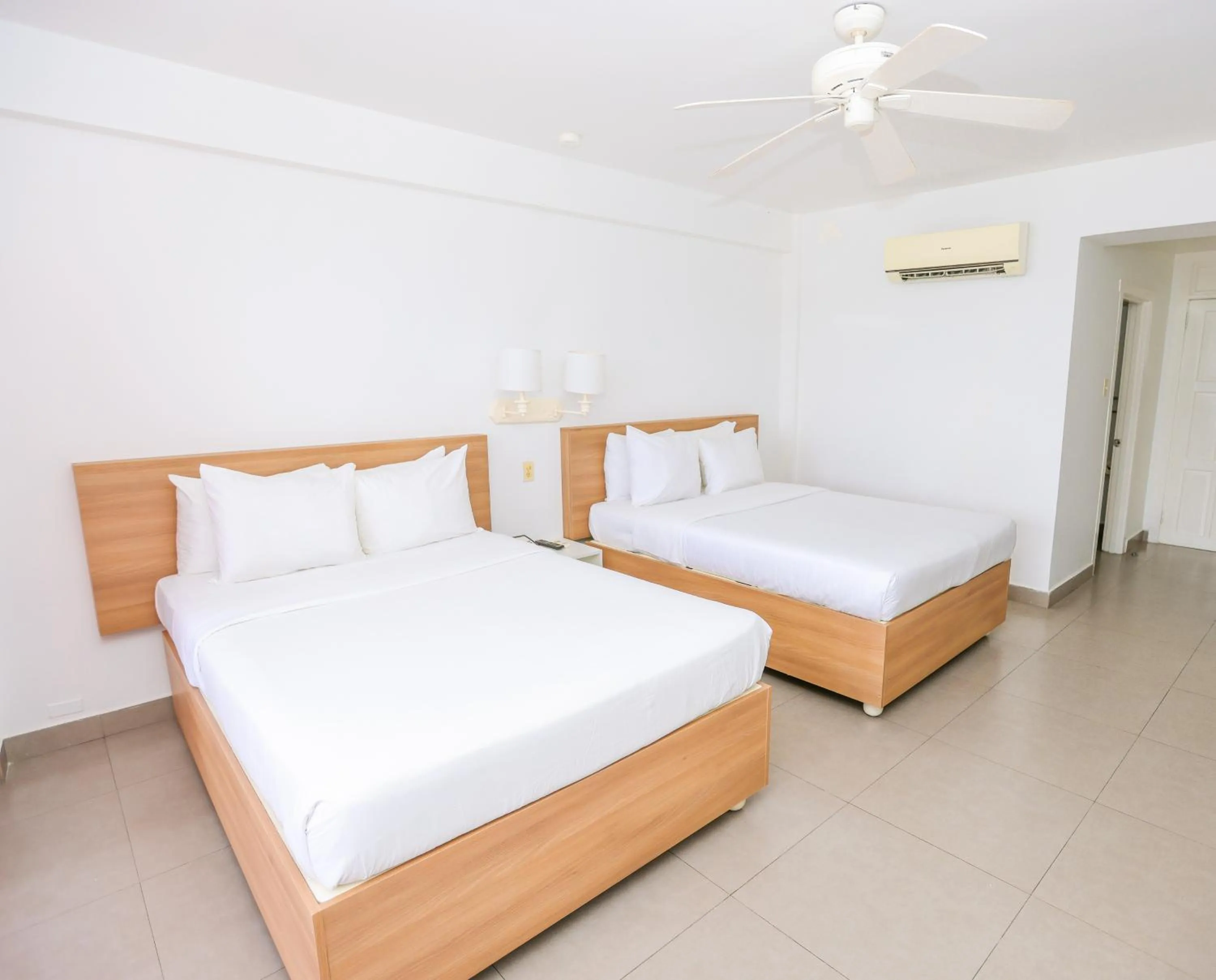 Property building, Bed in Grand Decameron Montego Beach, A Trademark All-Inclusive Resort