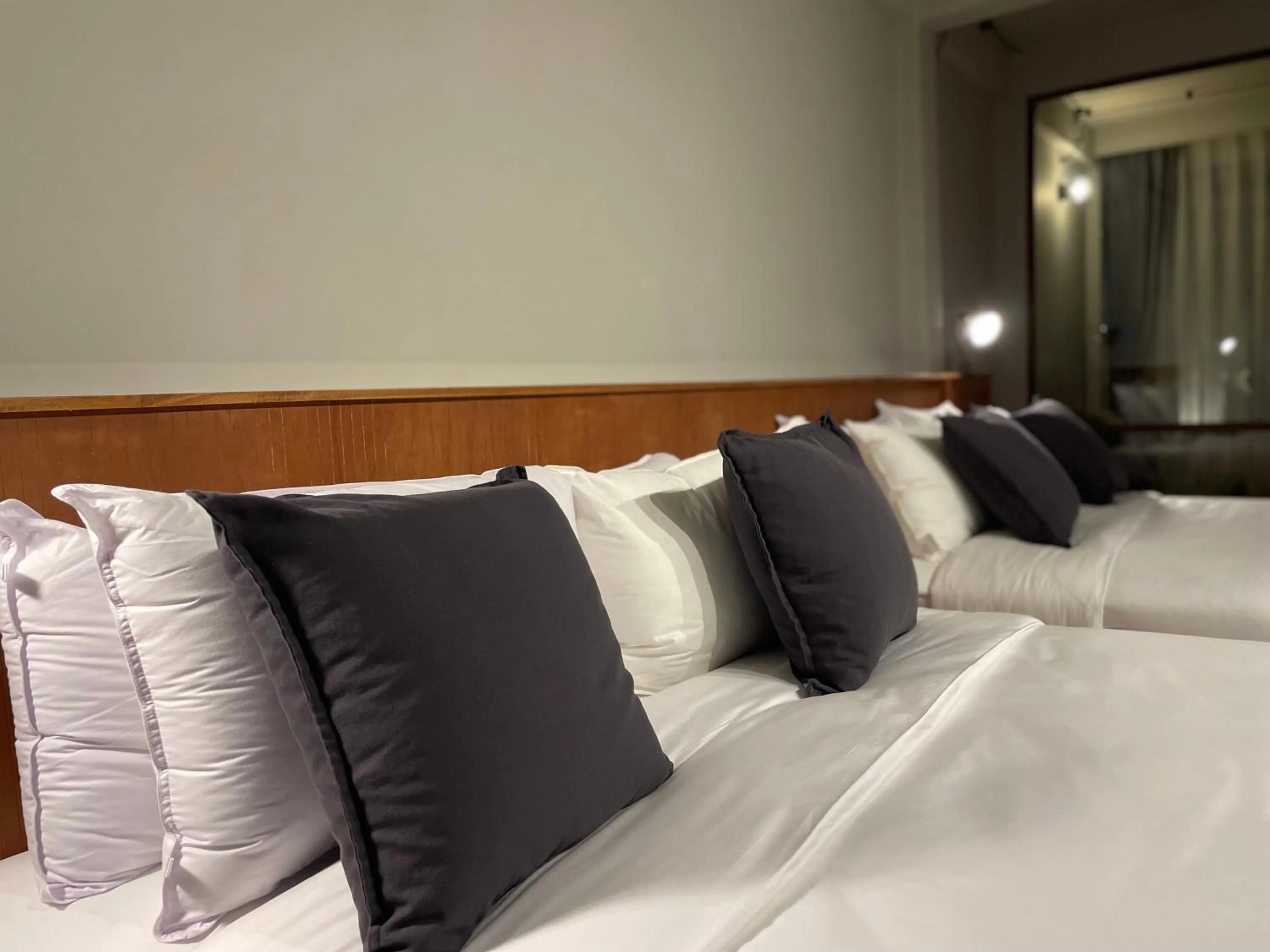 Bed in GalileOasis Boutique Hotel