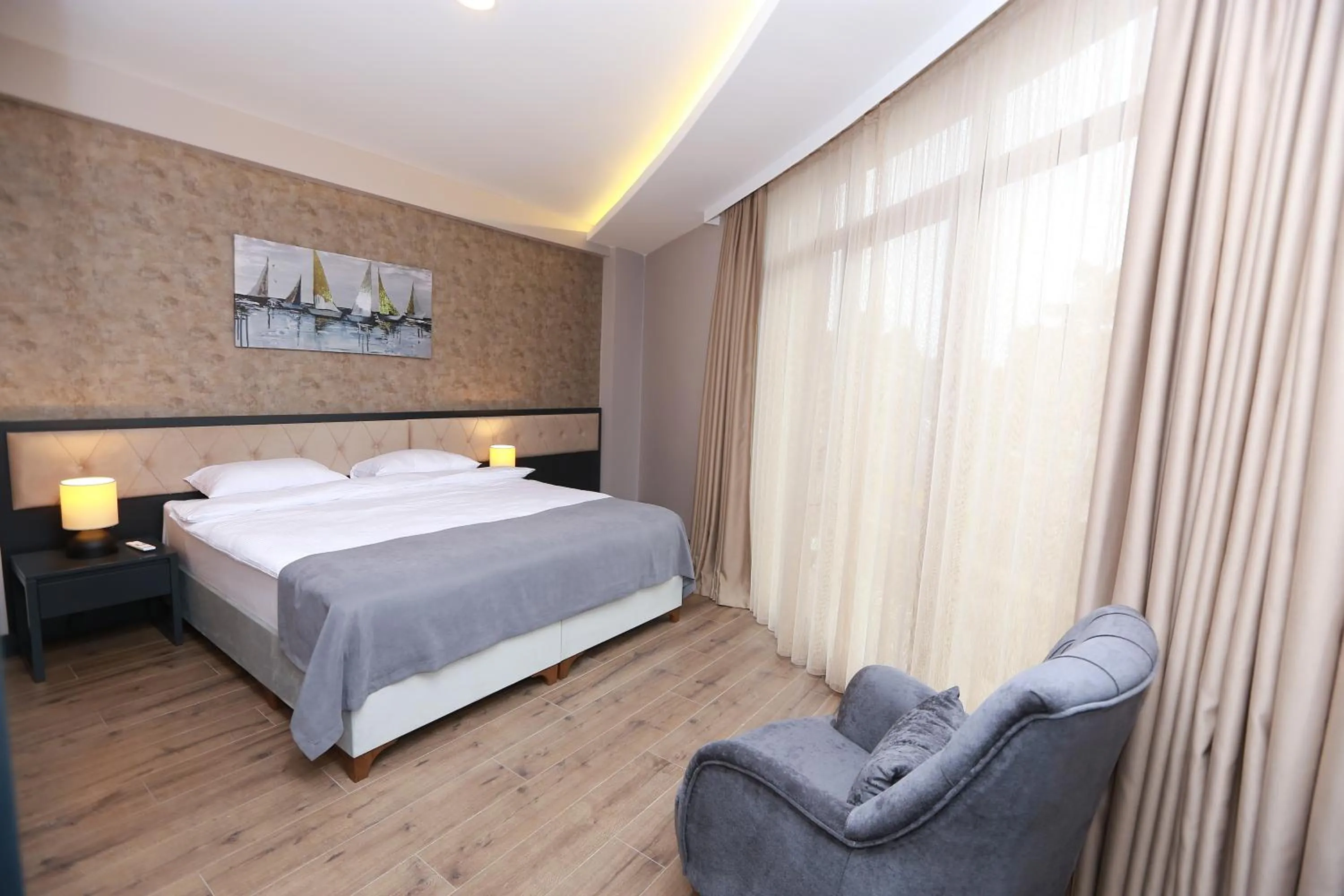 Bed in PENTAHOR HOTEL