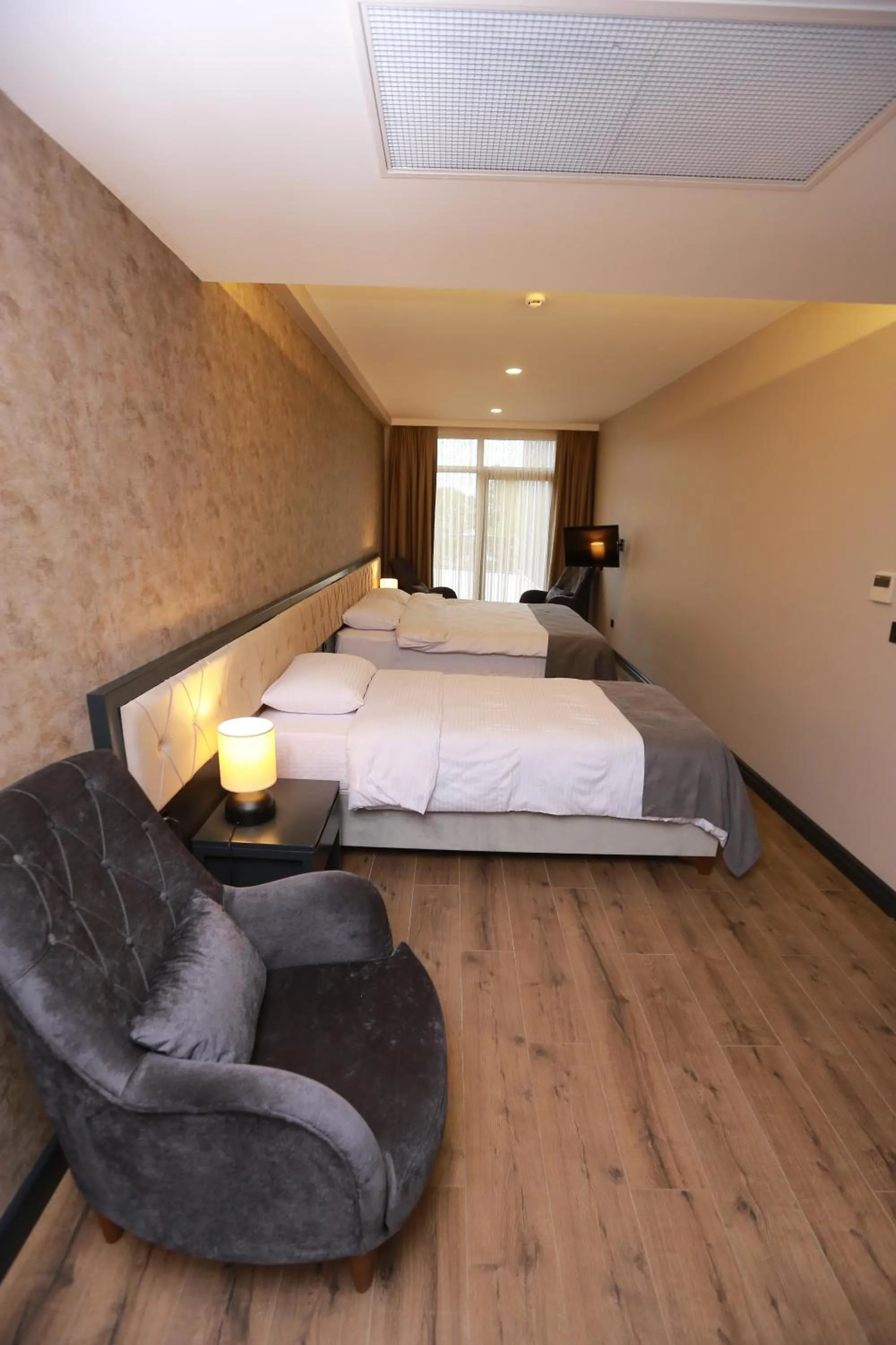 Bed in PENTAHOR HOTEL