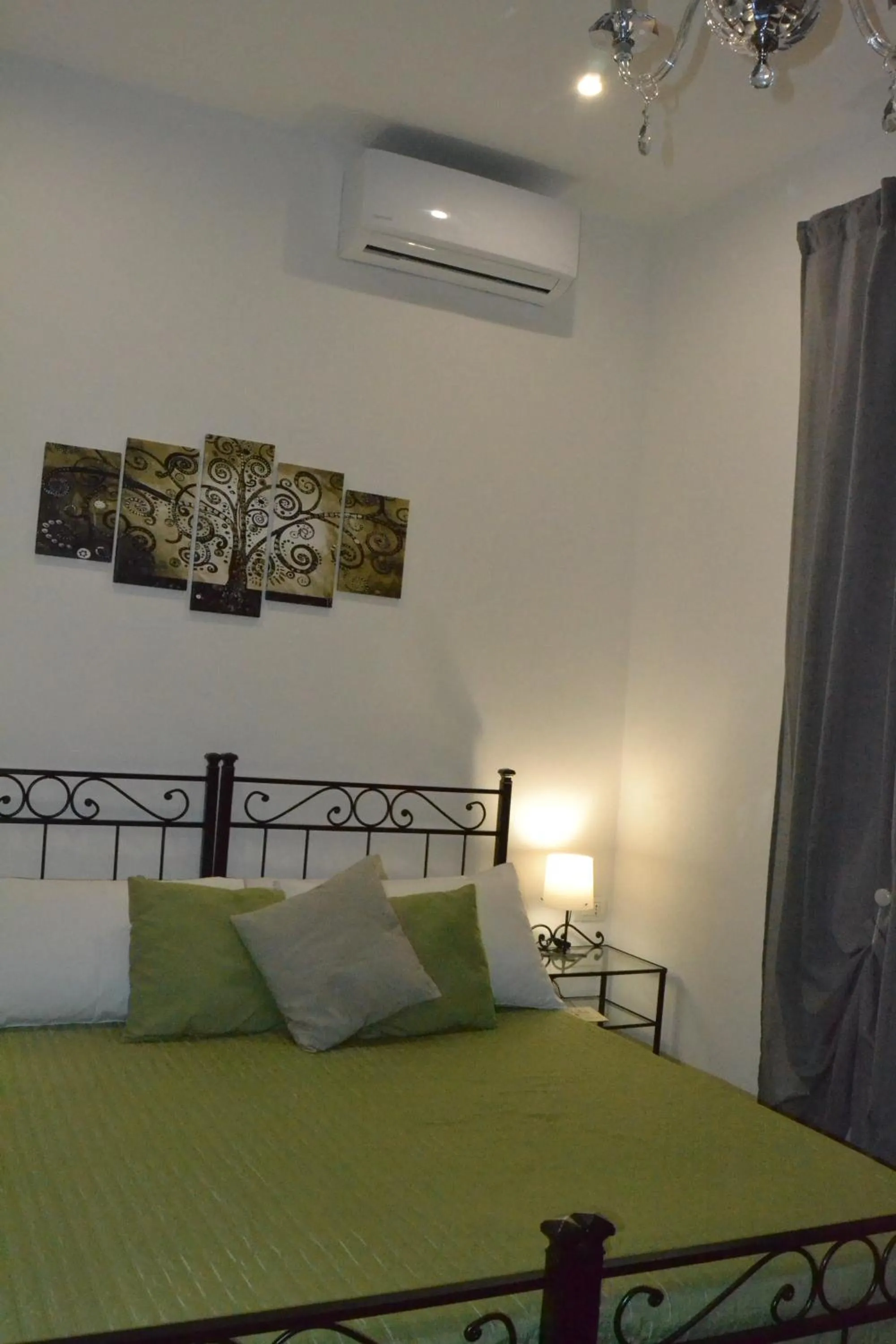 air conditioner, Bed in Karina's Rooms