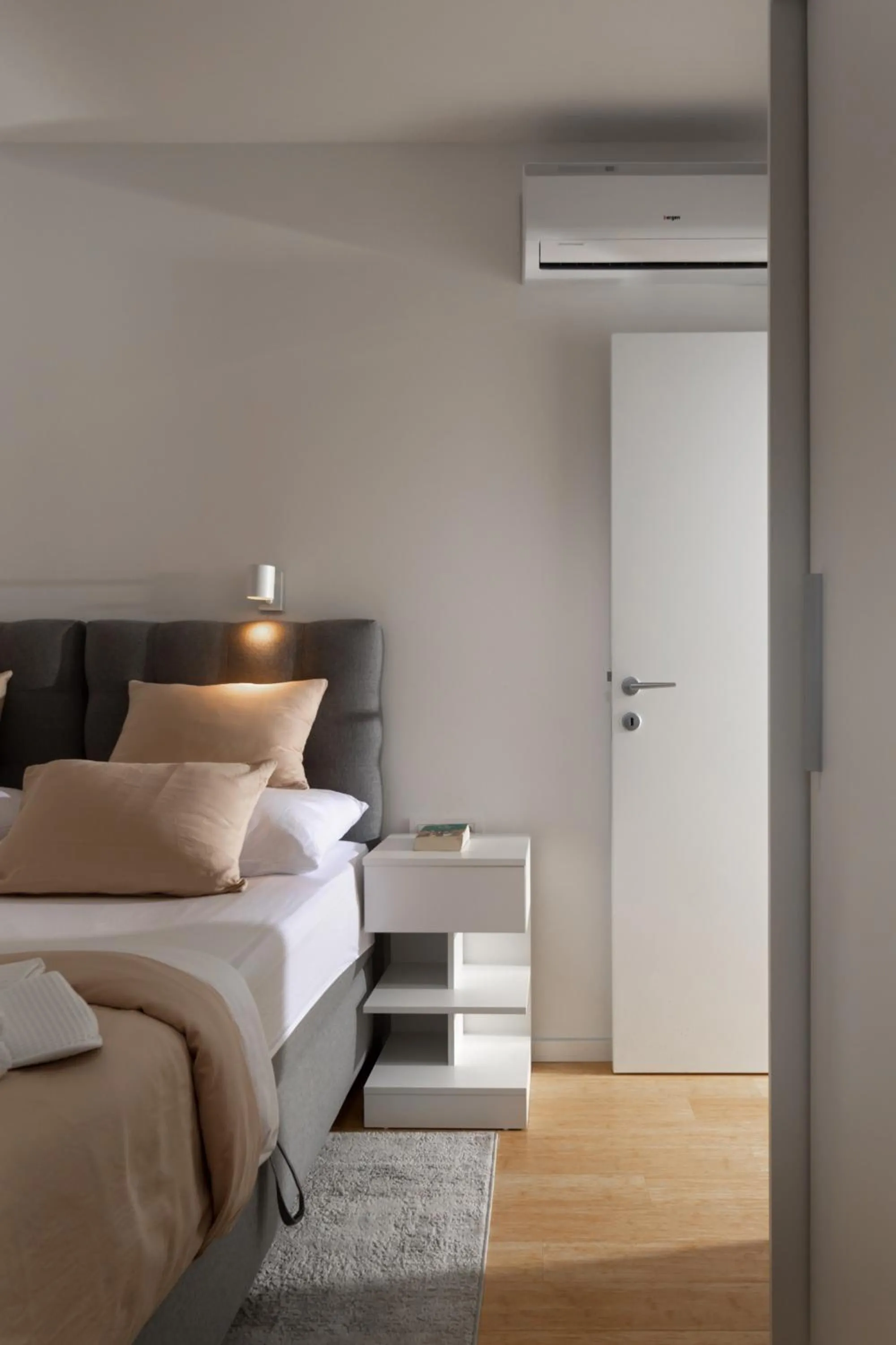 Bed in Luxury apartment Marco Polo with a private swimming pool with salt sea water
