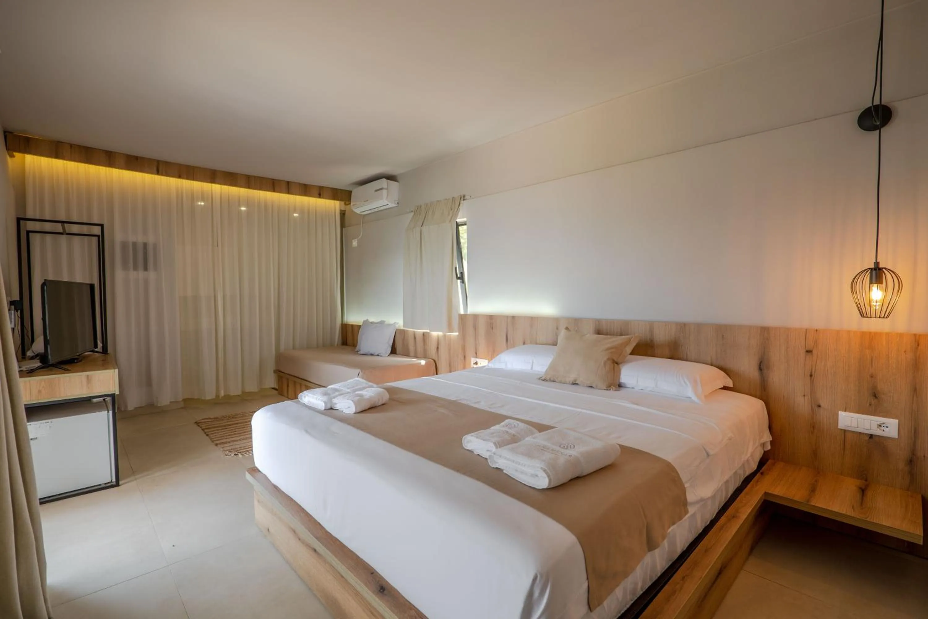 Bed in Arameras Beach Resort