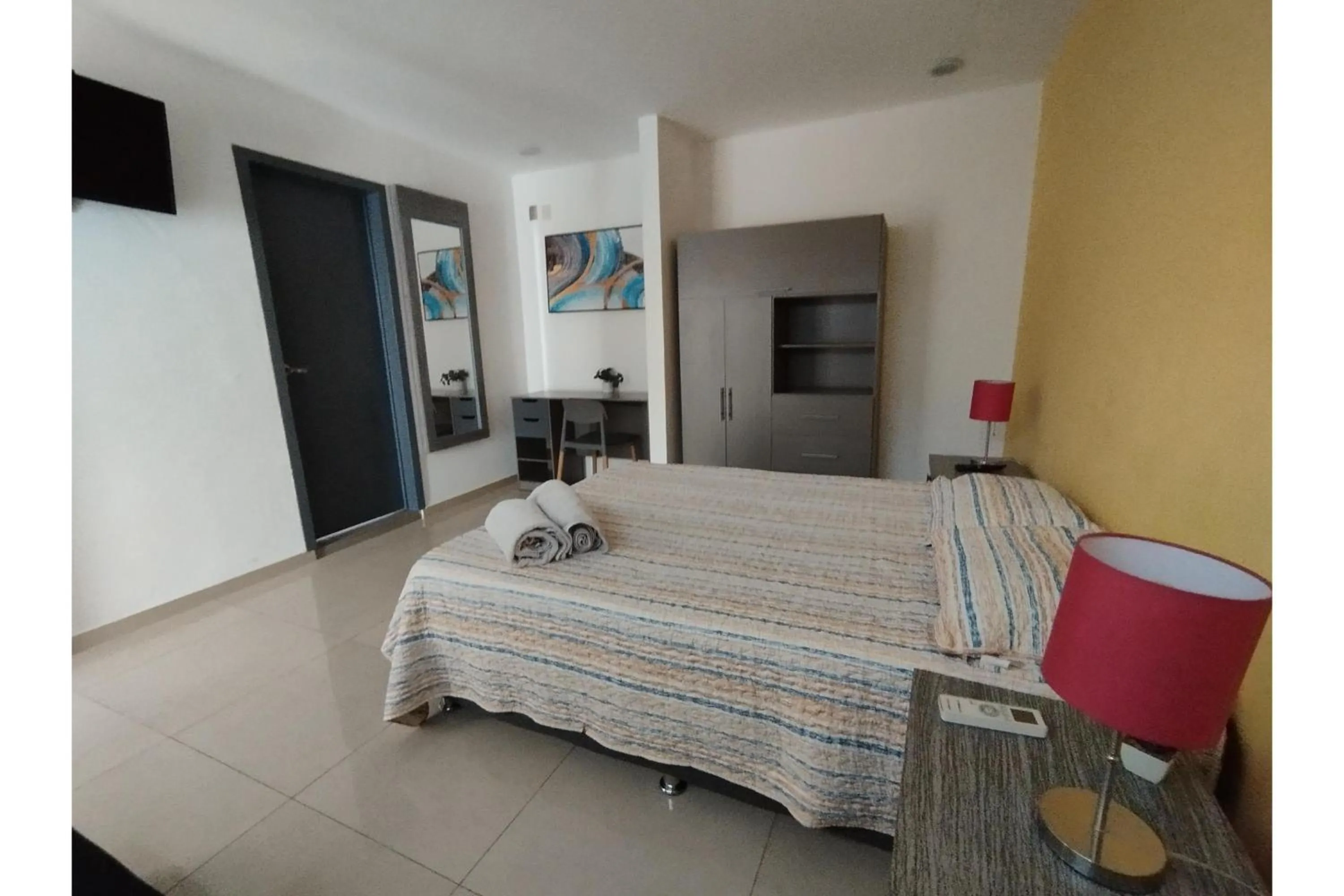 Bedroom, Bed in Capital O Tu Estancia