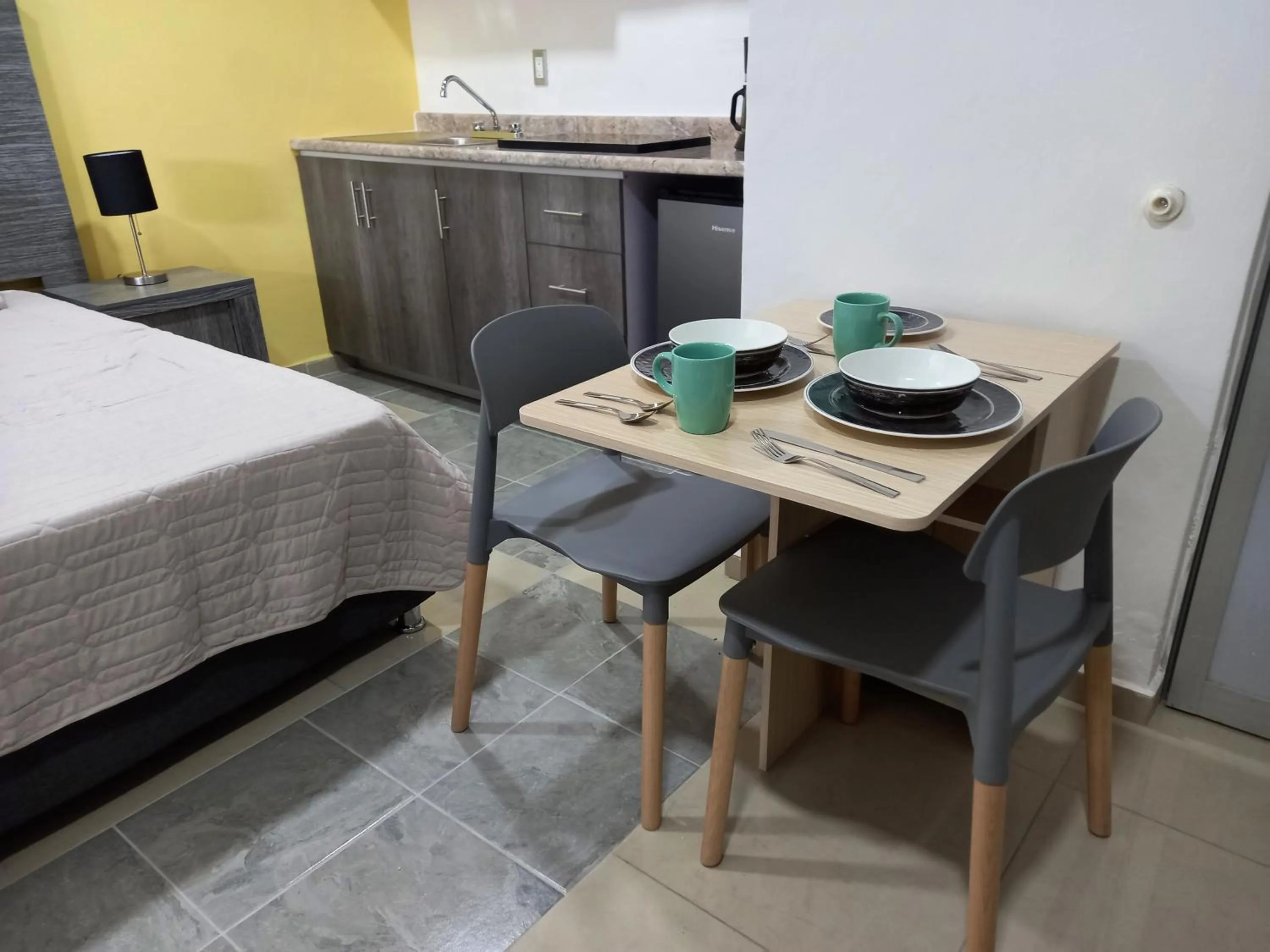 Seating area, Bed in Capital O Tu Estancia