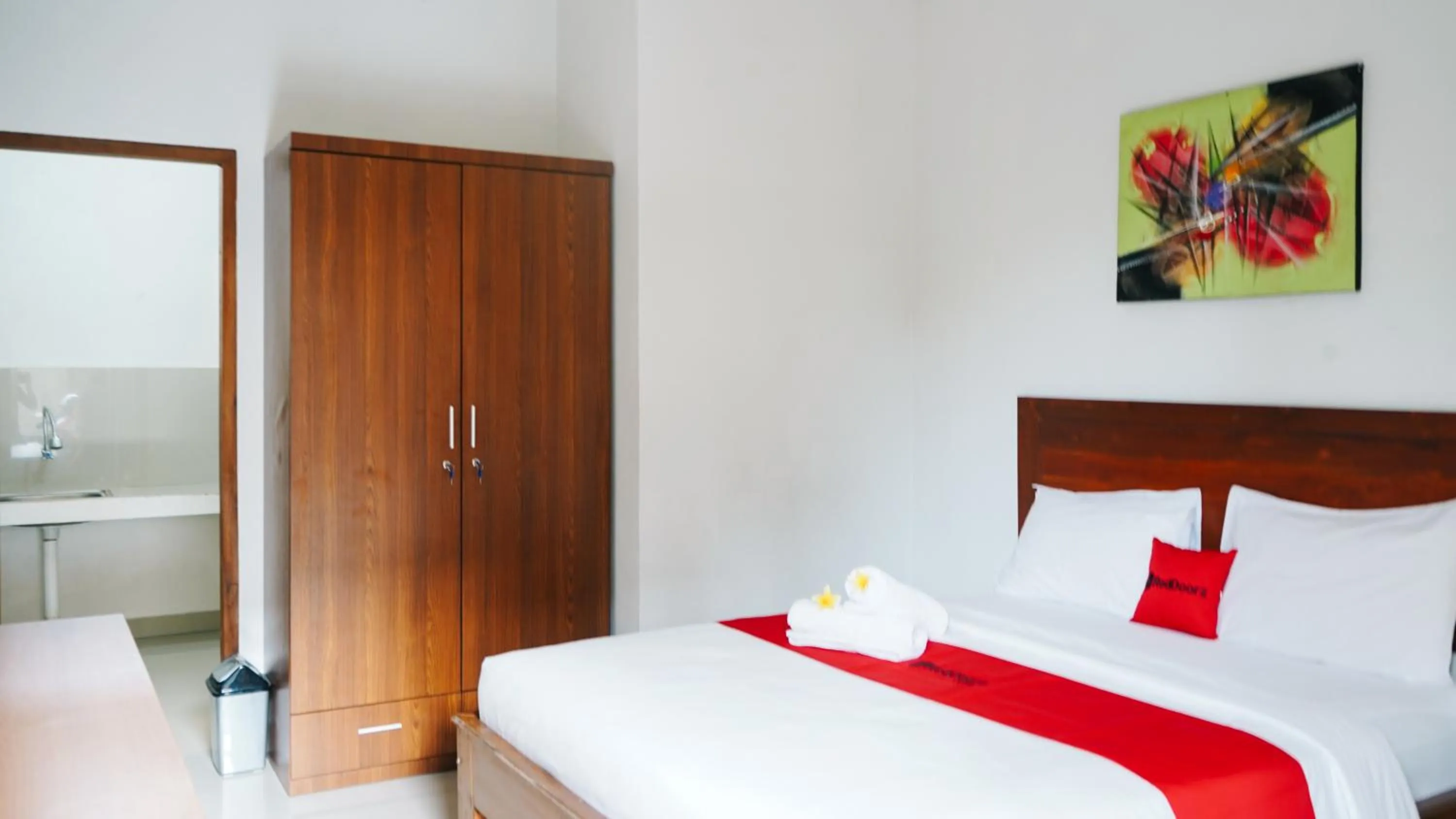 Bed in RedDoorz at Ampenan Mataram Lombok