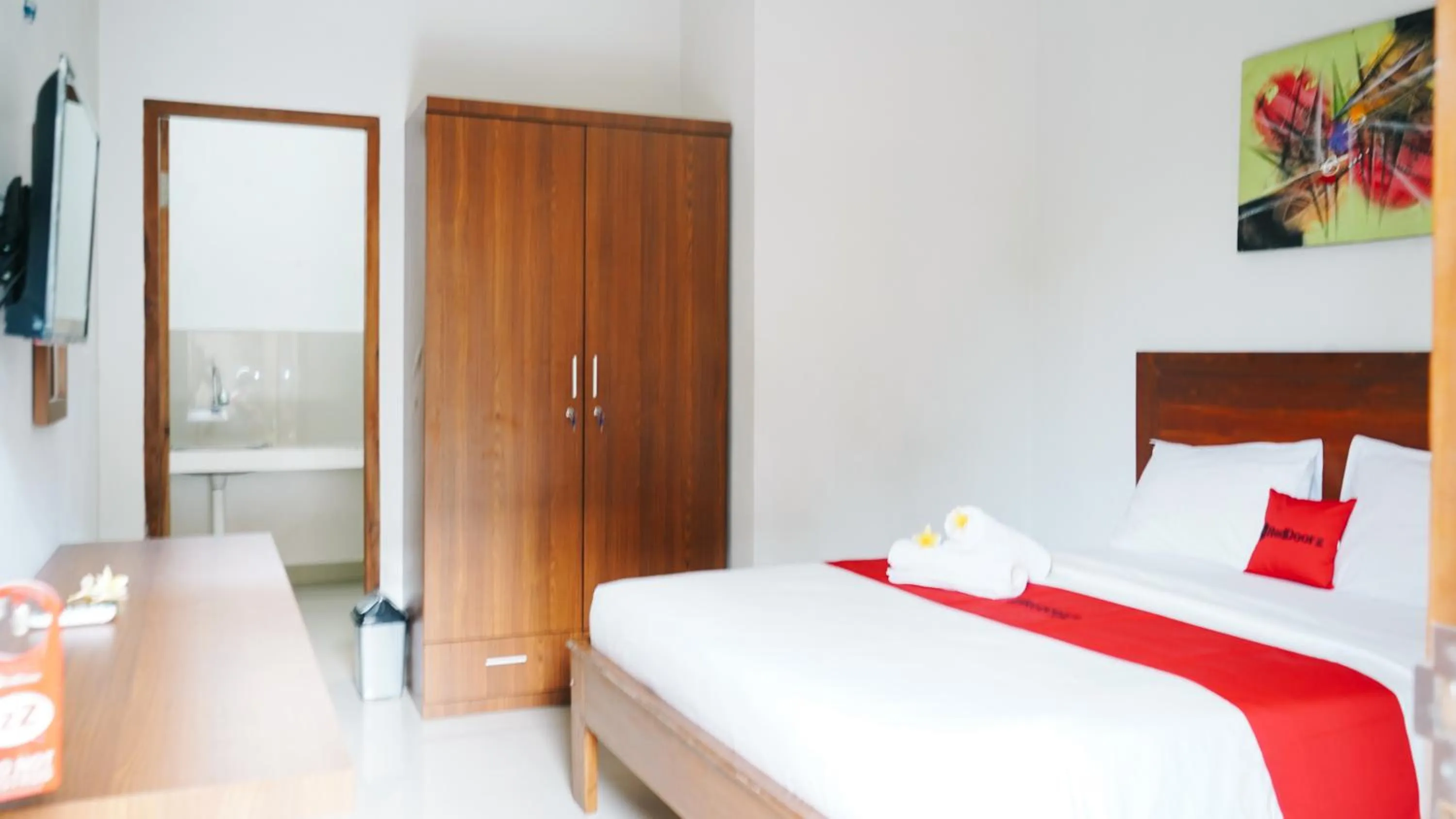 Bed in RedDoorz at Ampenan Mataram Lombok
