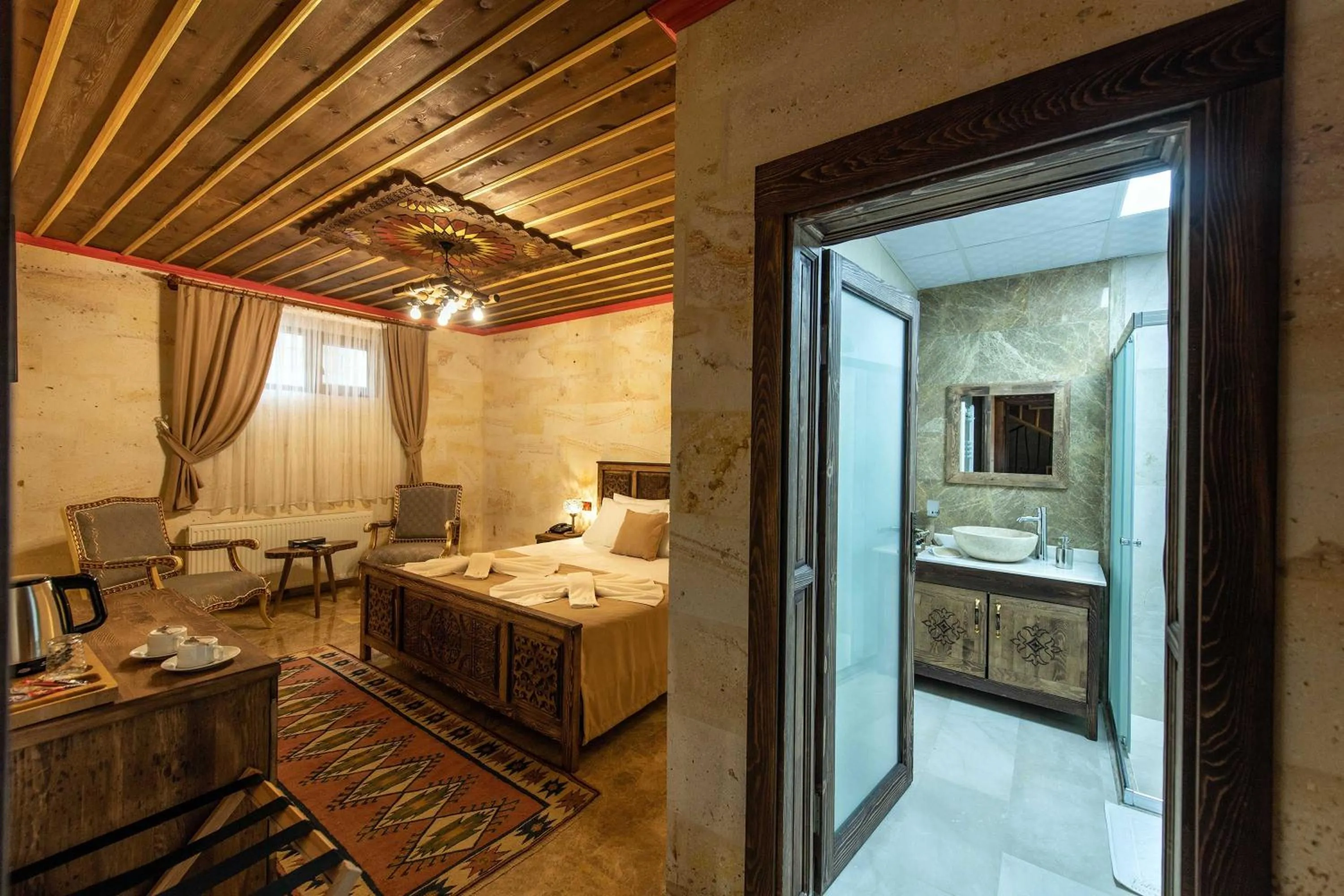 Photo of the whole room, Bed in Volare Stone Hotel