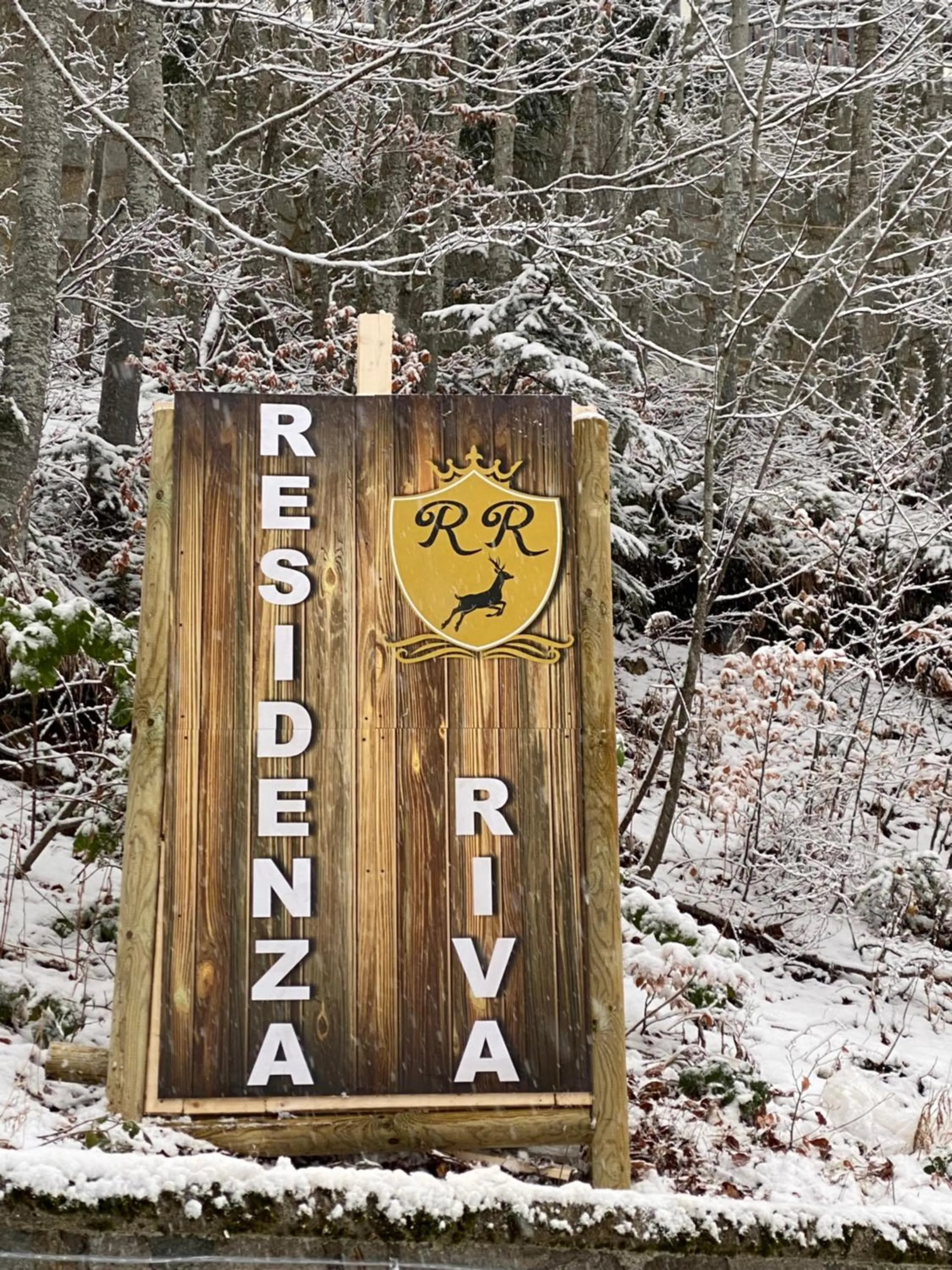 Property logo or sign in Residenza Riva Wellness Apartment Spa