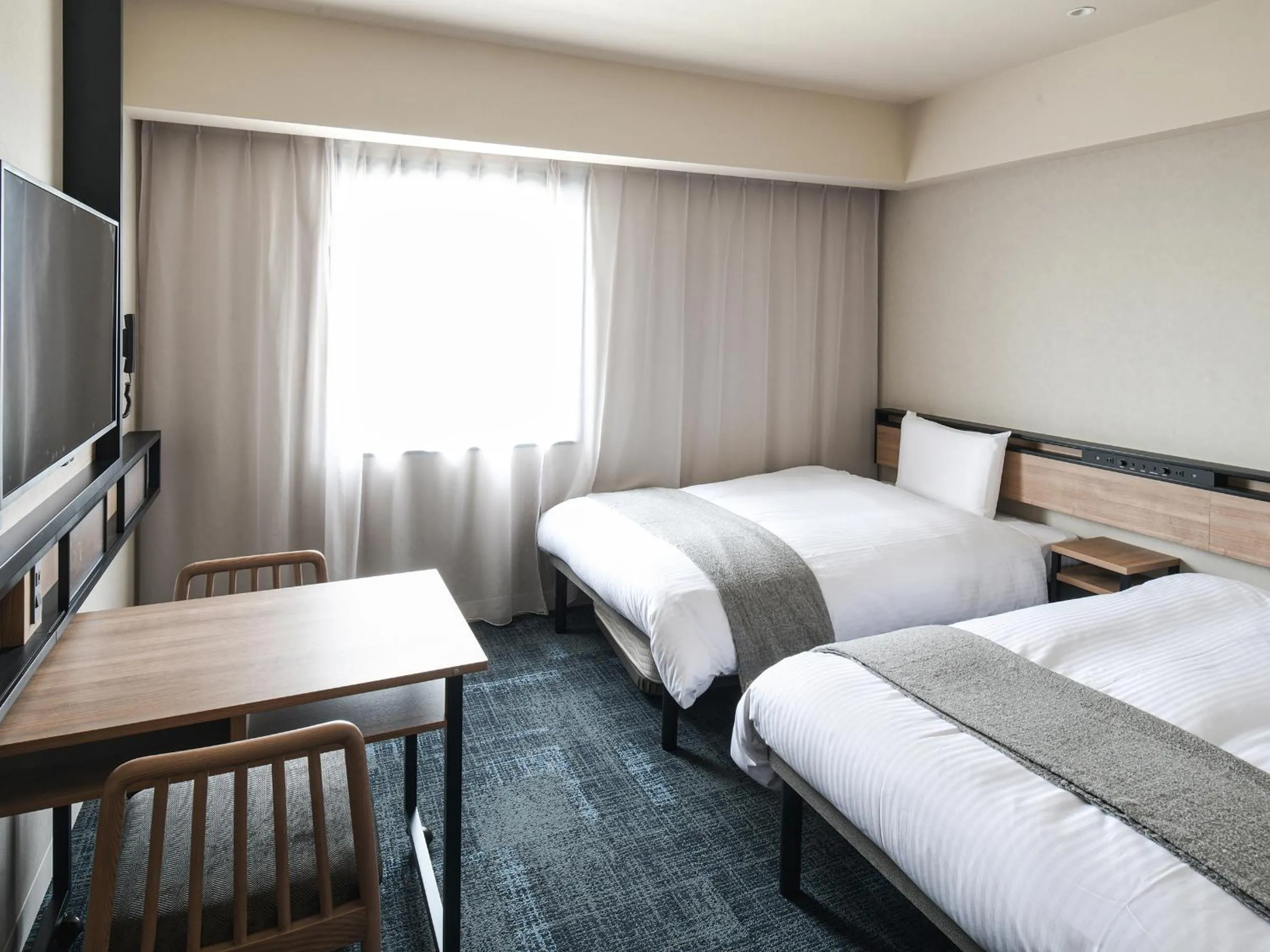 Bed in REF Kansai Airport by VESSEL HOTELS