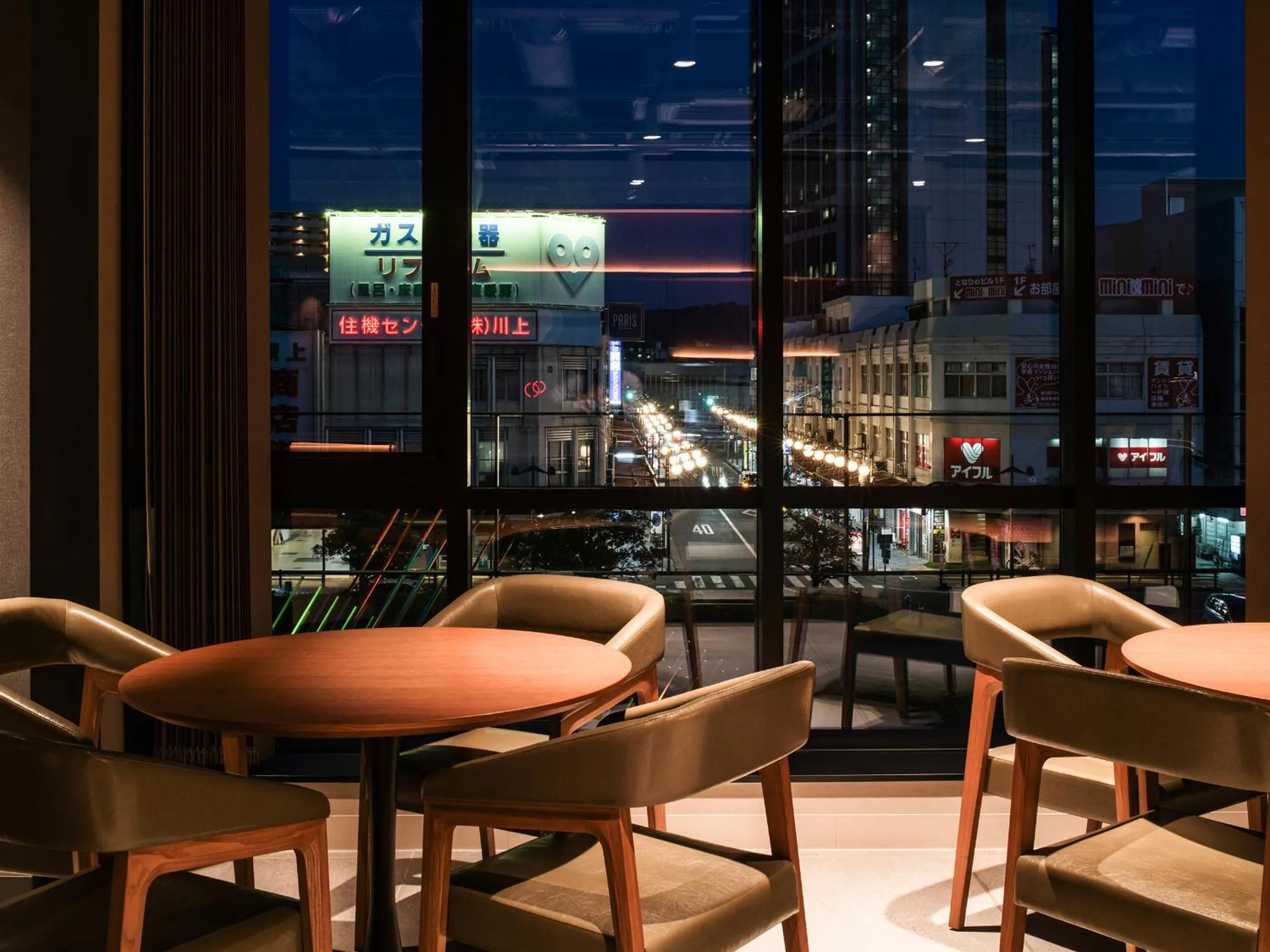 Communal lounge/ TV room in REF Kansai Airport by VESSEL HOTELS