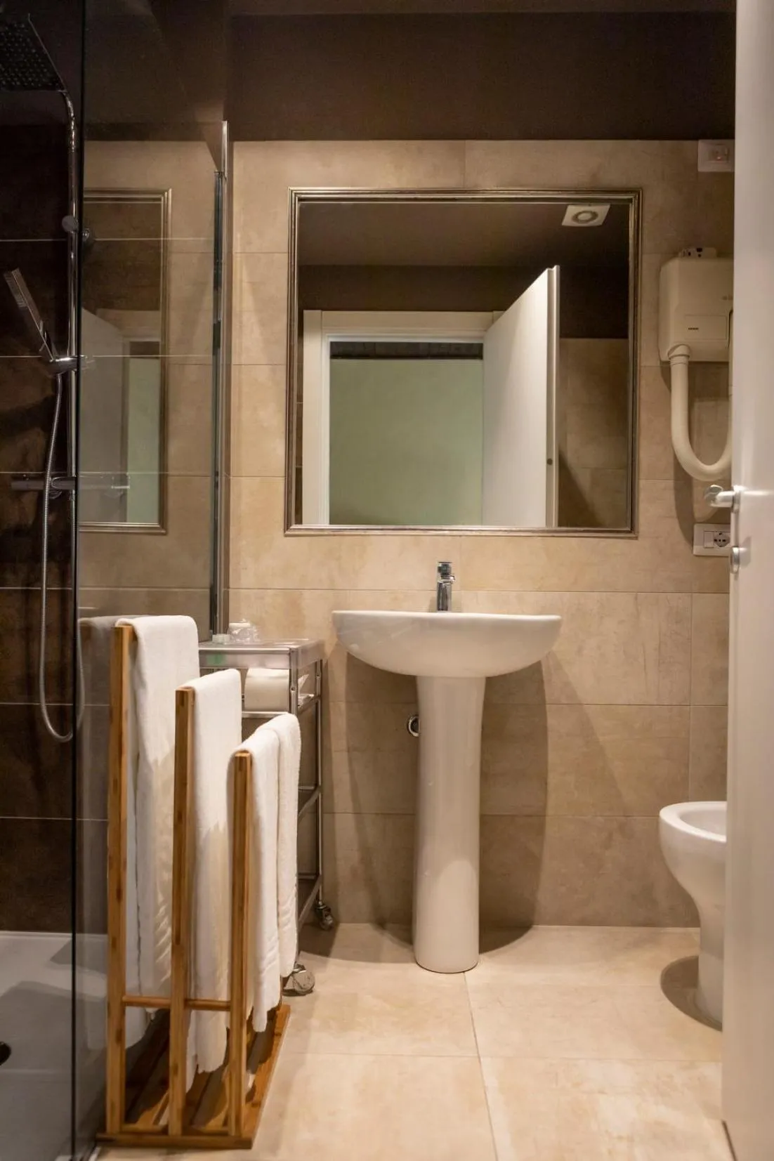 Bathroom in Hotel Milano Pool & Garden