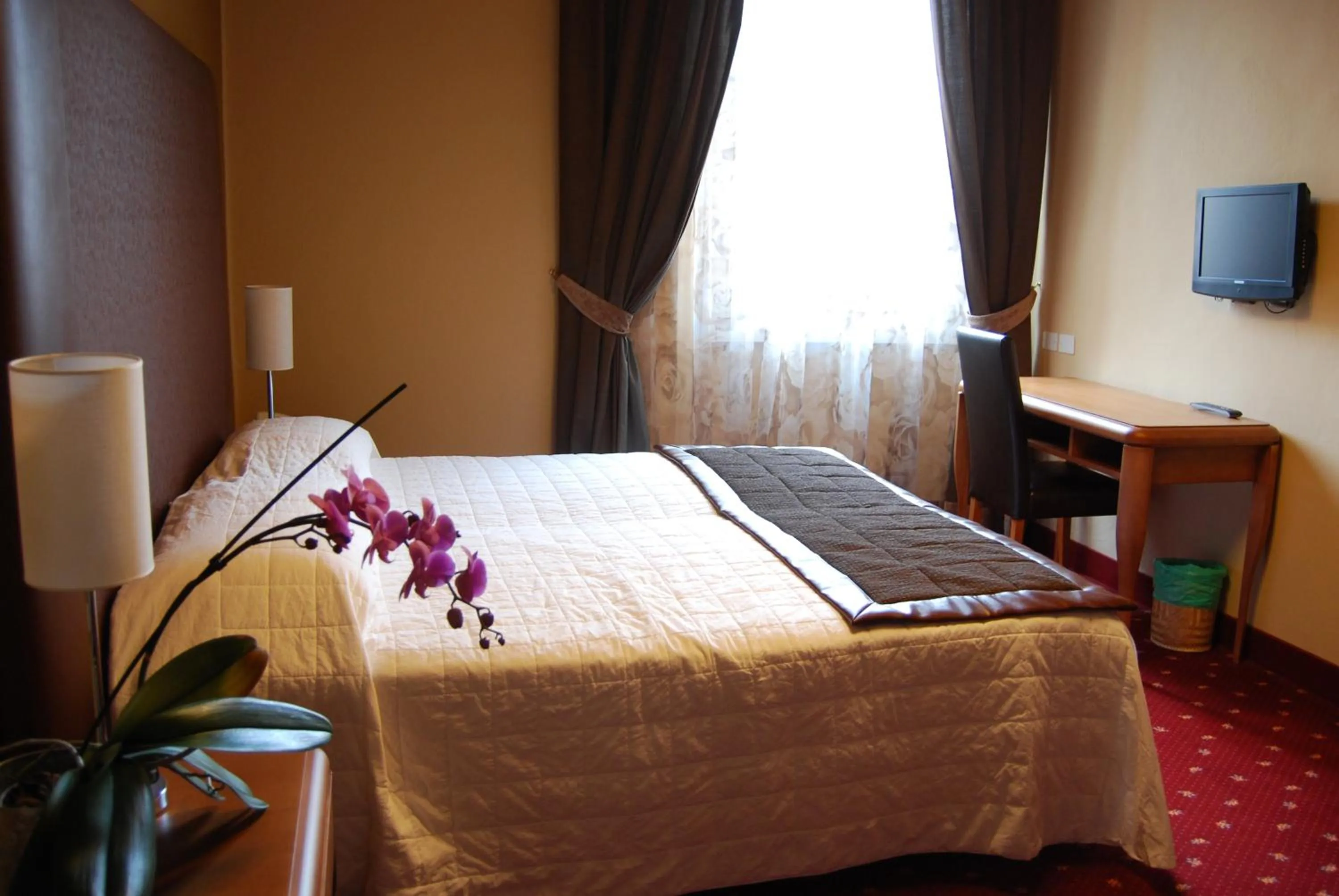 Bedroom, Bed in Hotel Milano Pool & Garden