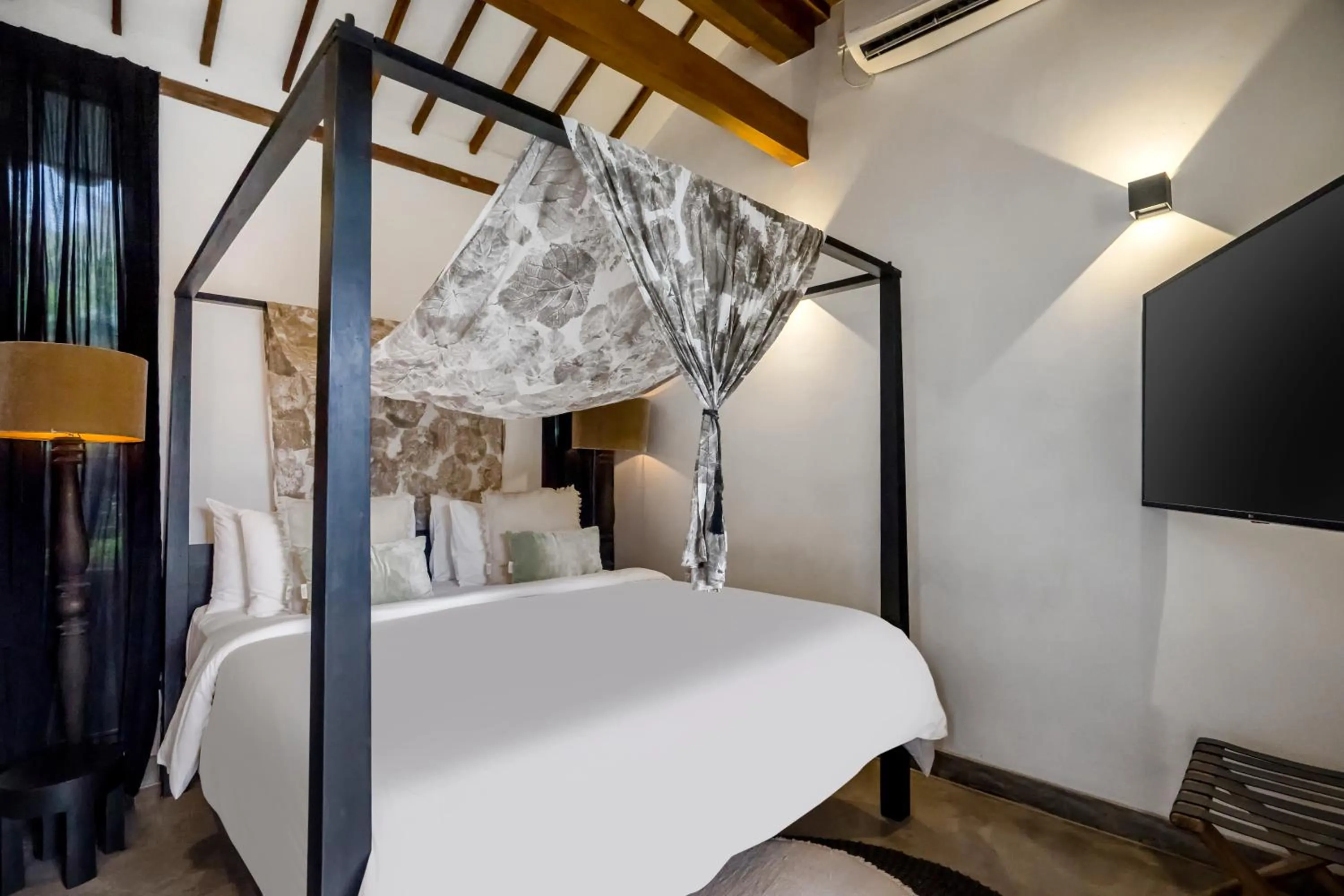 Bed in Bloom Resort Bali by BaliSuperHost