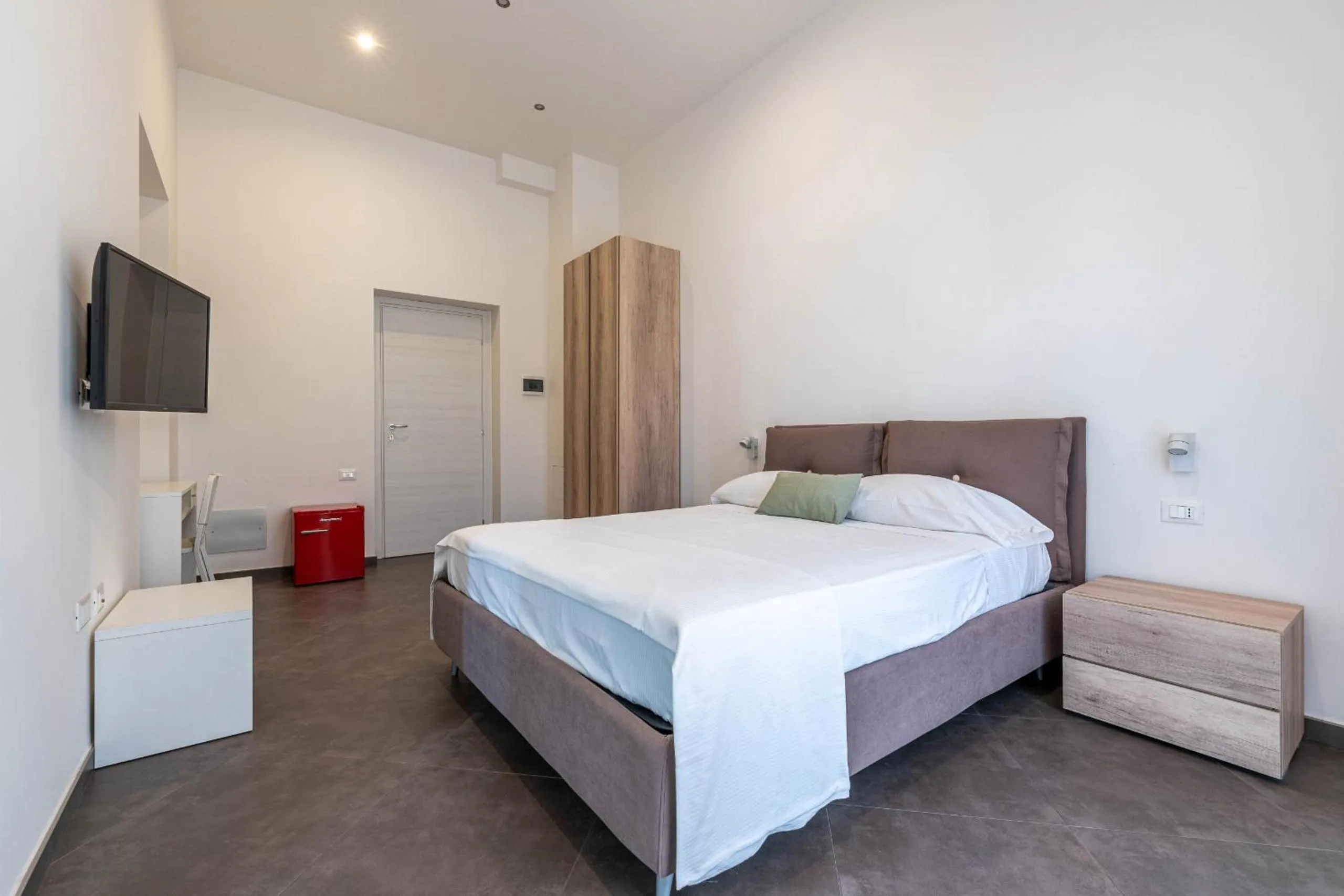 Bed in Apartments La Cala by Wonderful Italy