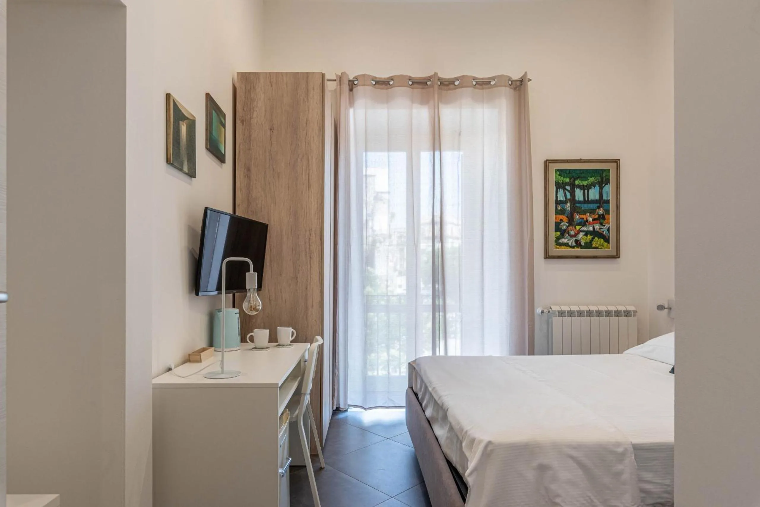 Bed in Apartments La Cala by Wonderful Italy