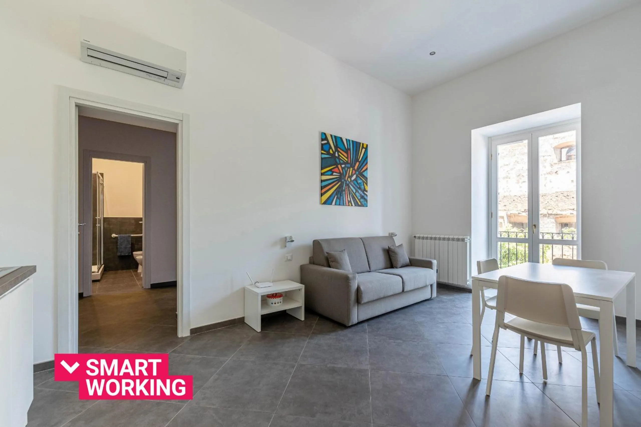 Communal lounge/ TV room in Apartments La Cala by Wonderful Italy