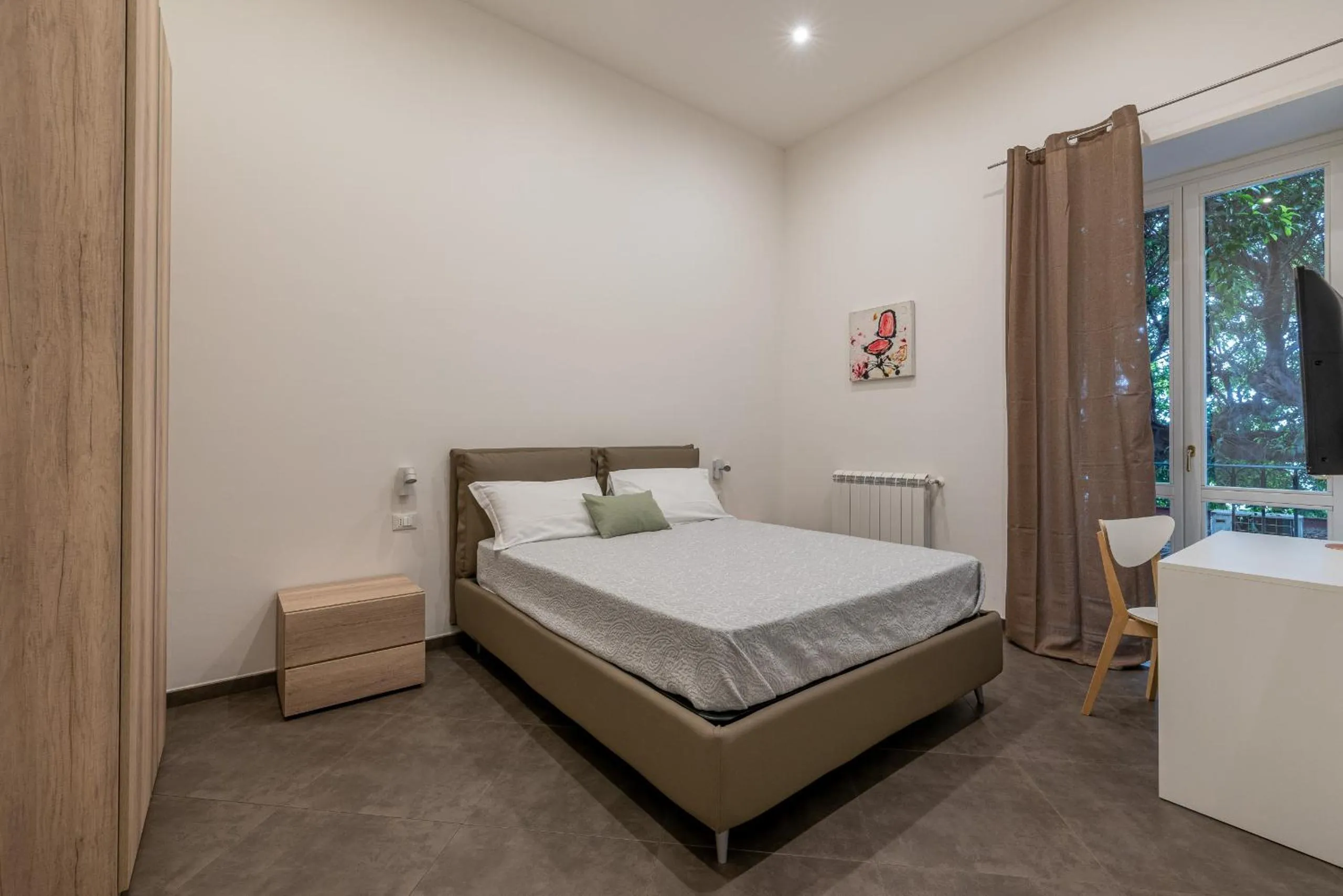 Bed in Apartments La Cala by Wonderful Italy