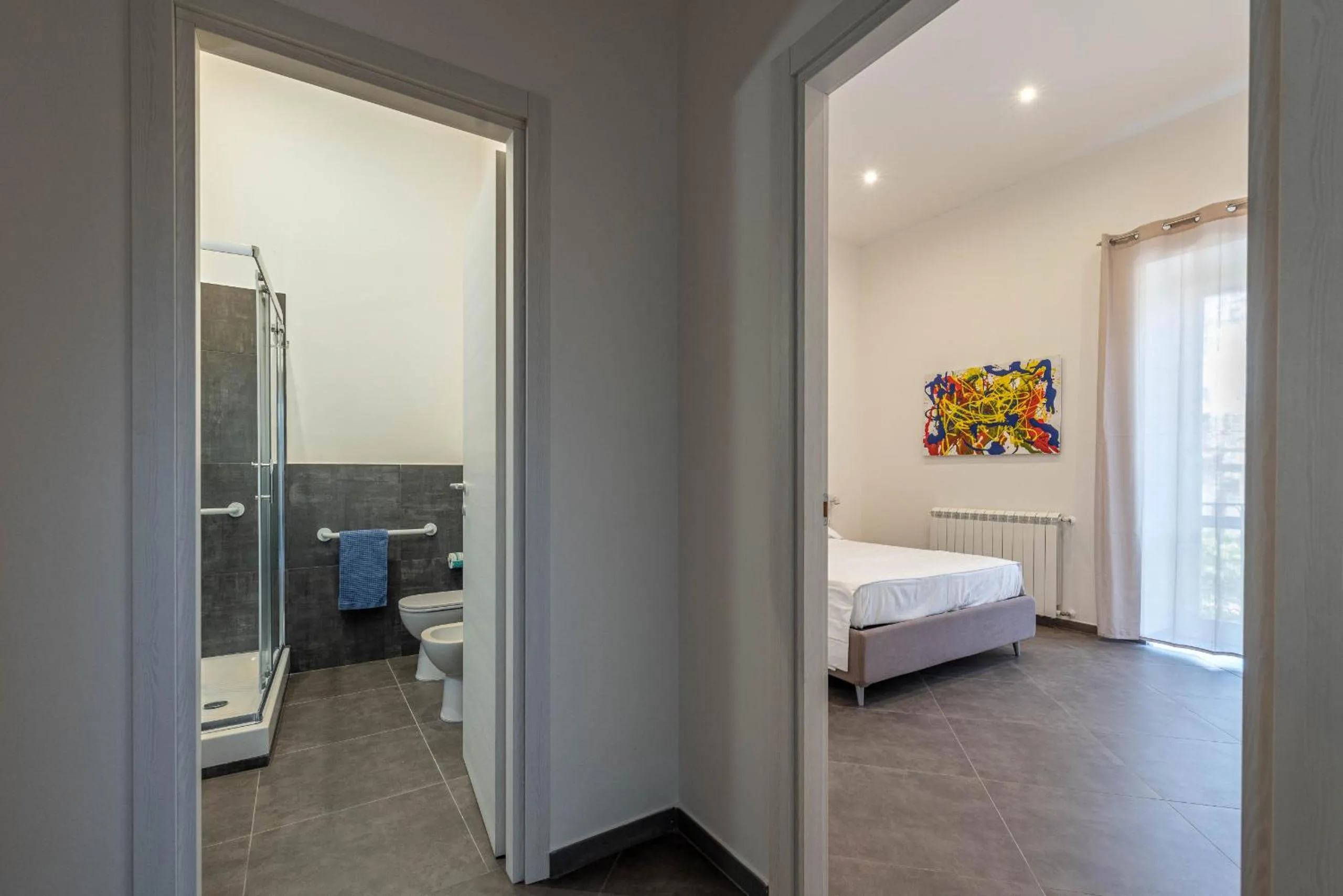 Bed in Apartments La Cala by Wonderful Italy