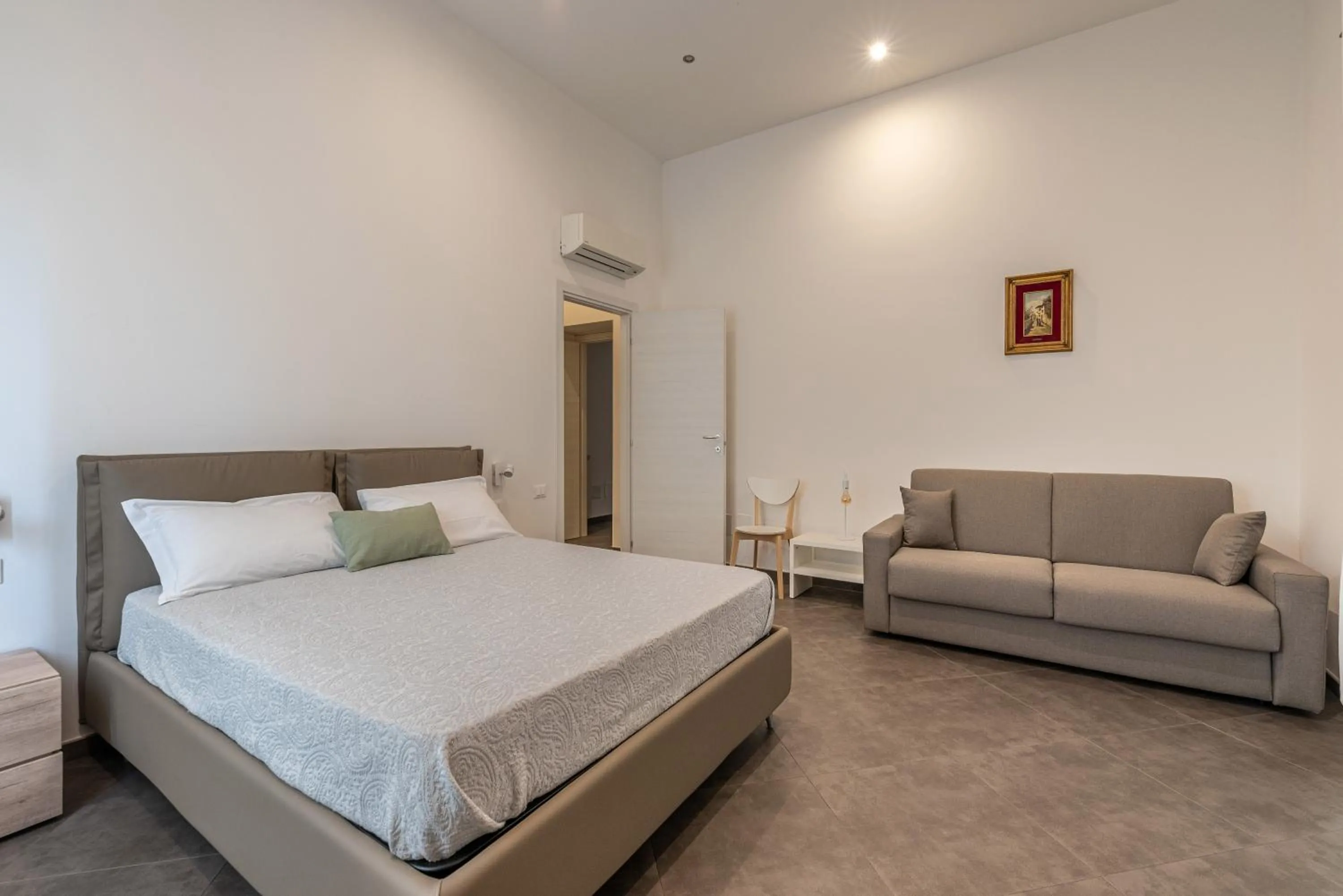 Bedroom, Bed in Apartments La Cala by Wonderful Italy