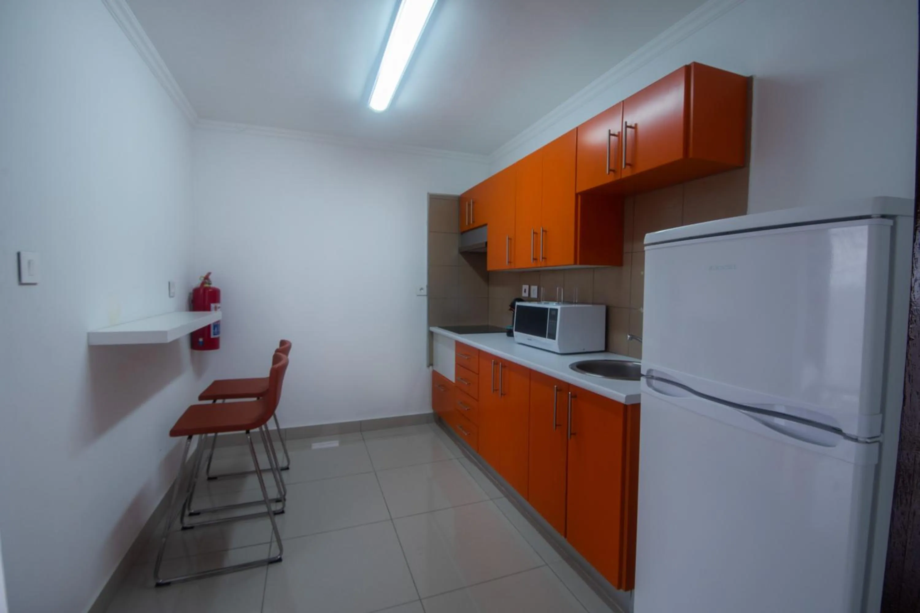Kitchen or kitchenette in WDC APARTHOTEL - BUEA