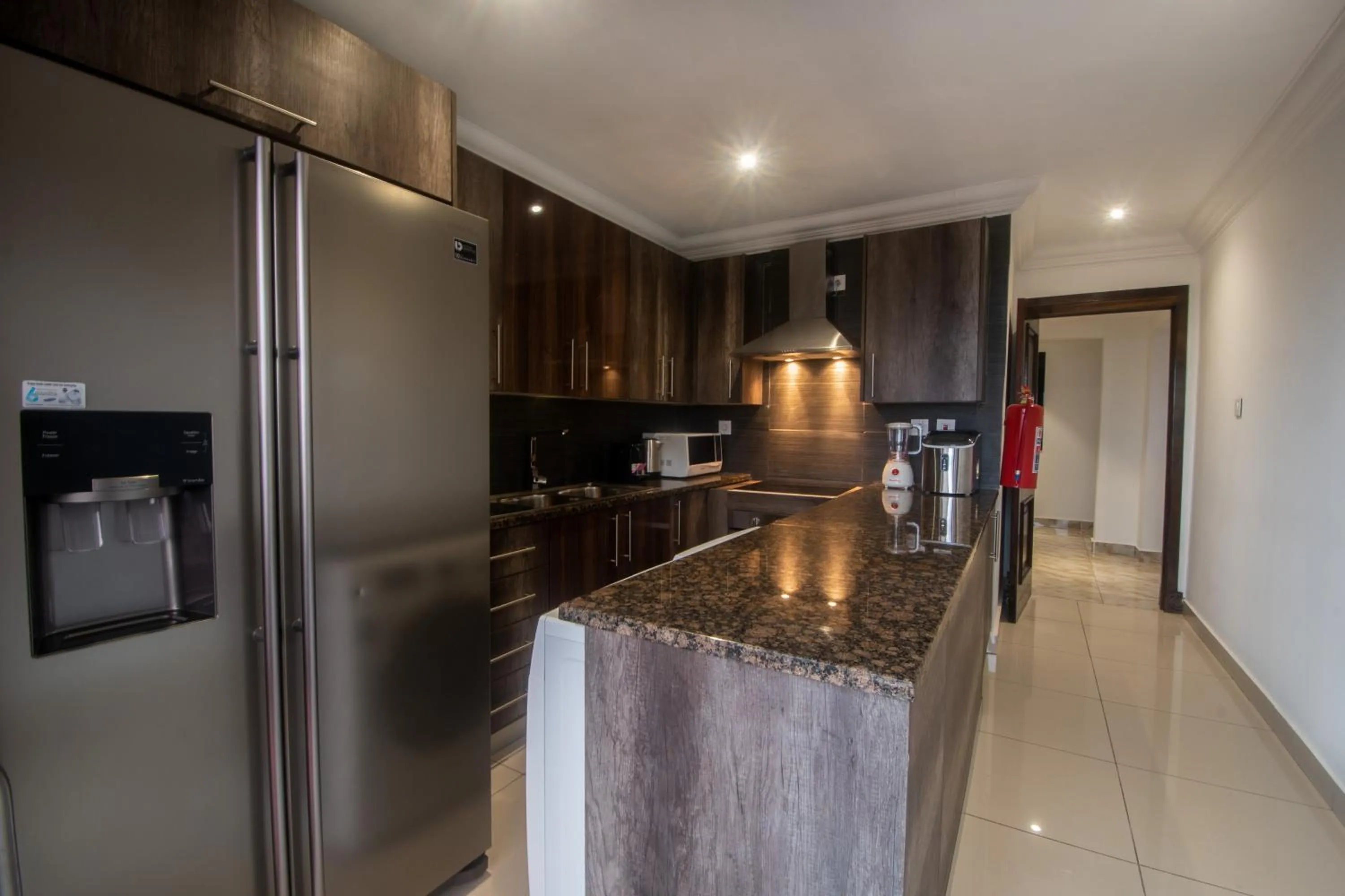 Kitchen or kitchenette in WDC APARTHOTEL - BUEA