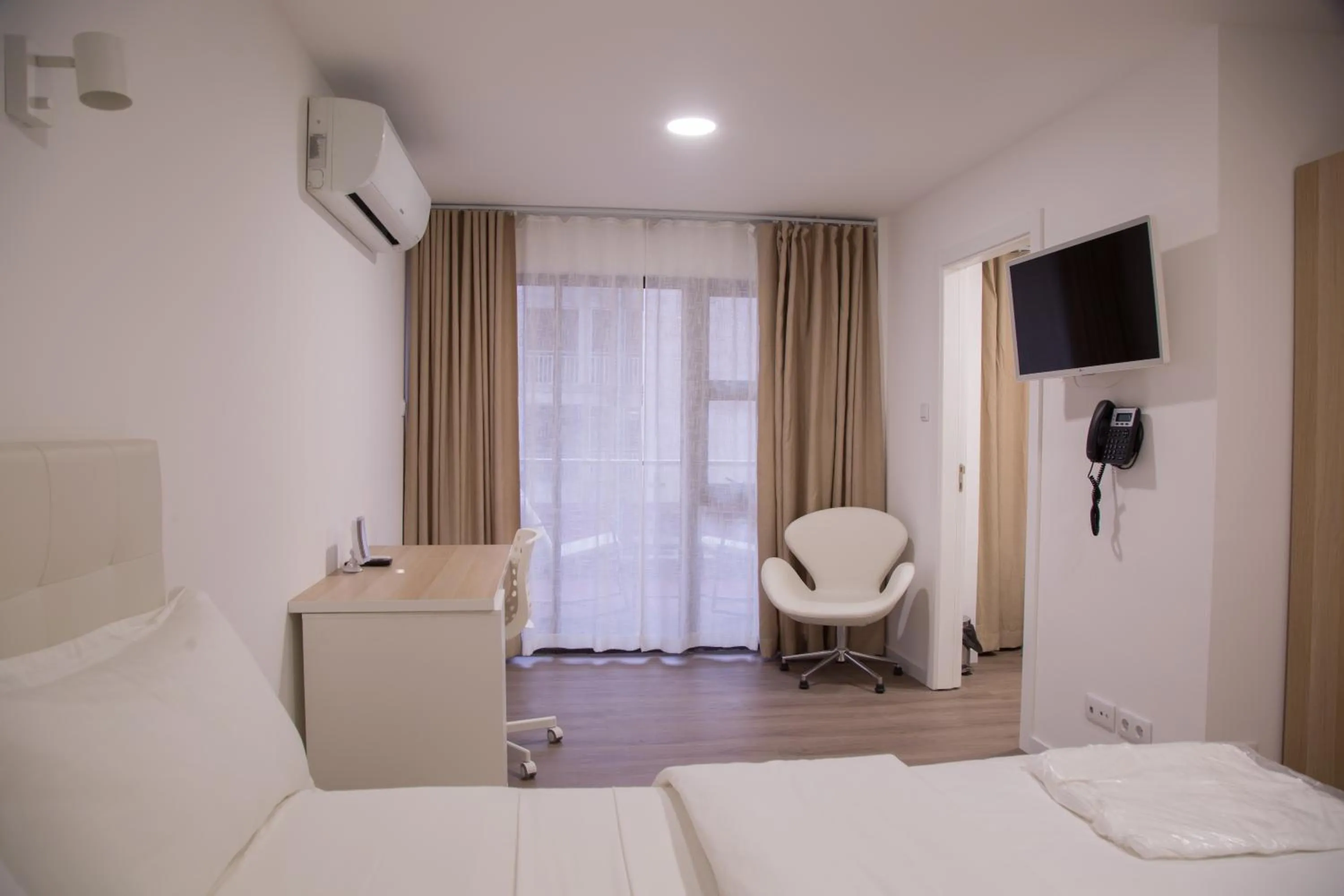 Photo of the whole room, Bed in WDC APARTHOTEL - BUEA