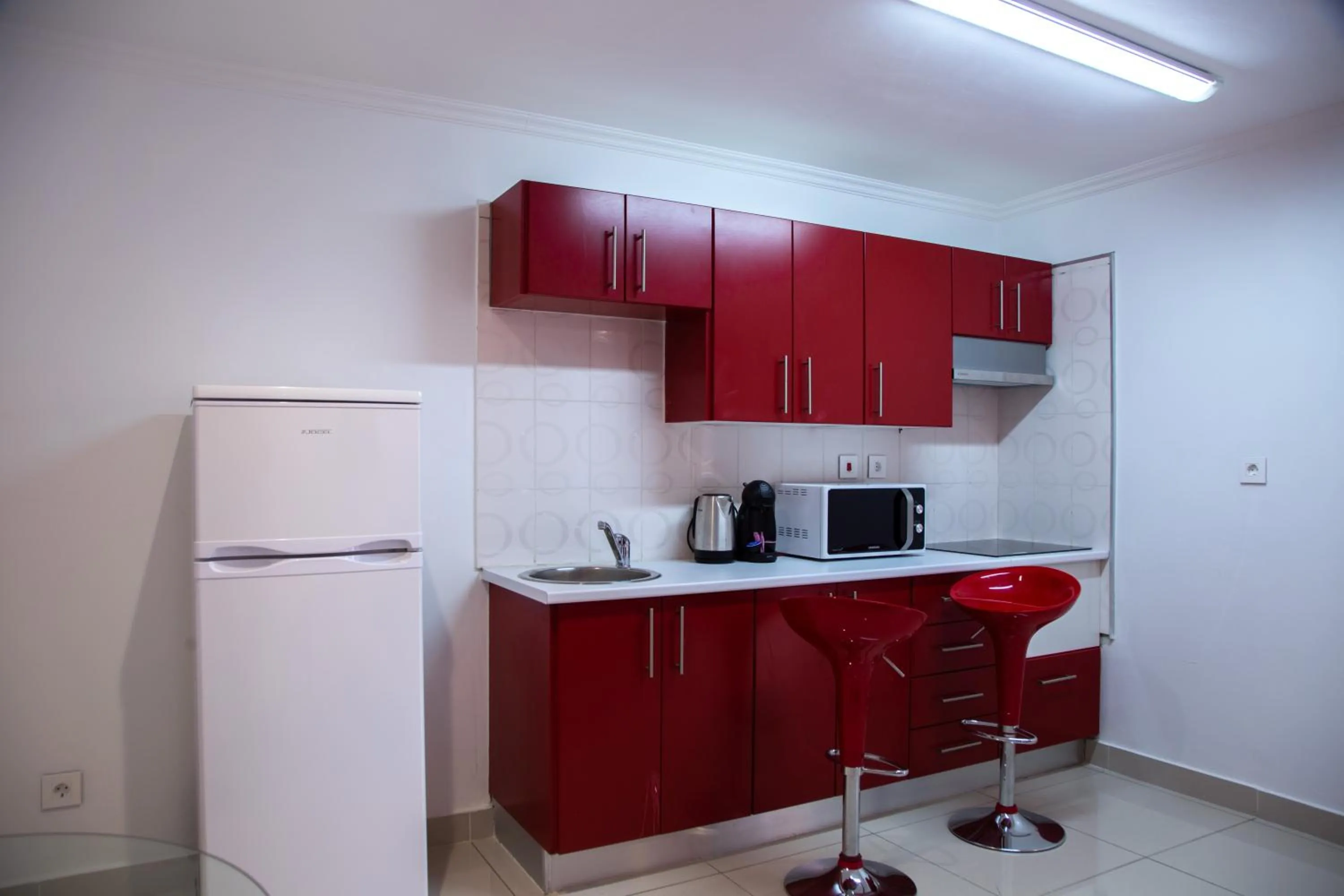 Kitchen or kitchenette in WDC APARTHOTEL - BUEA
