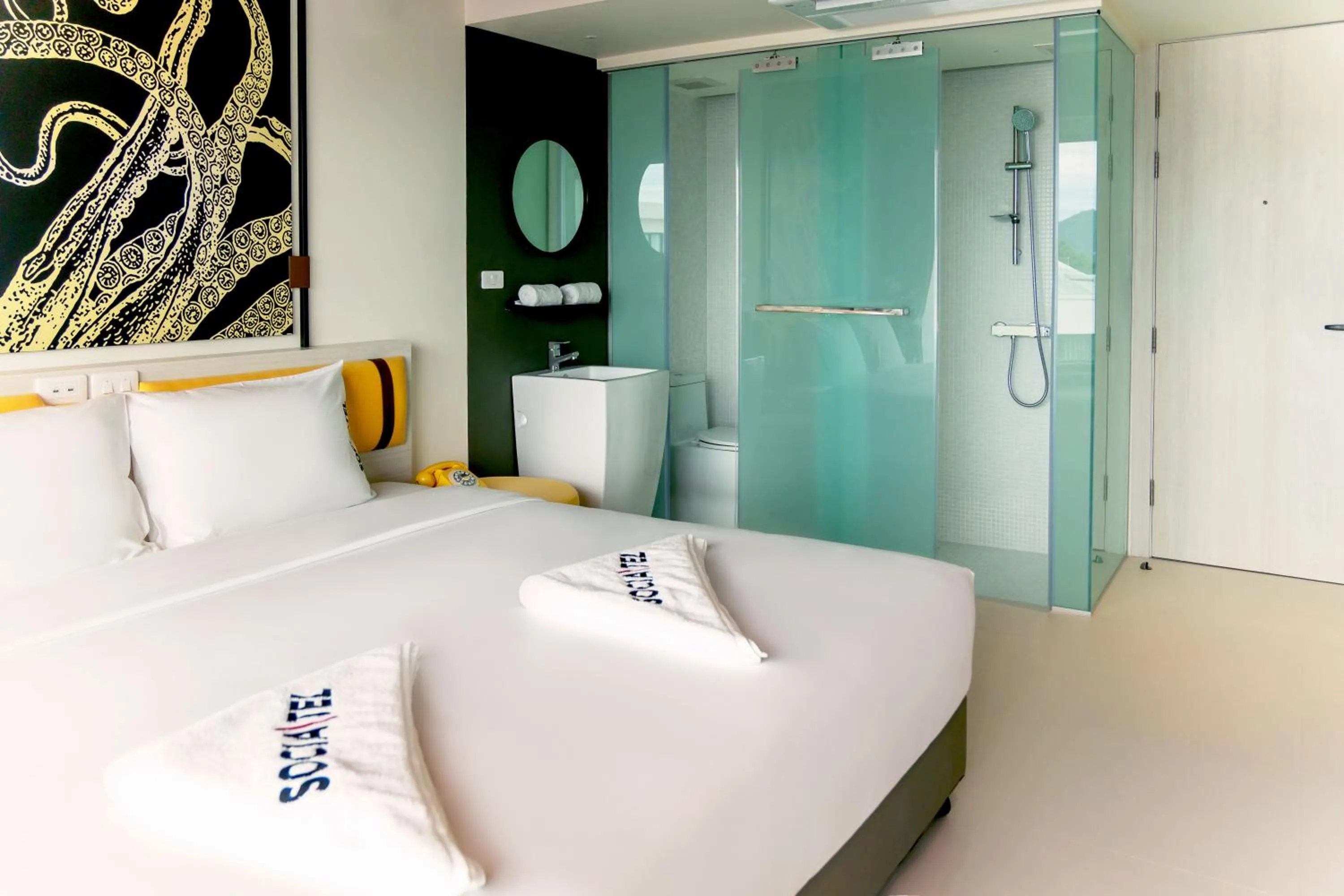 Photo of the whole room, Bed in SocialTel Koh Samui