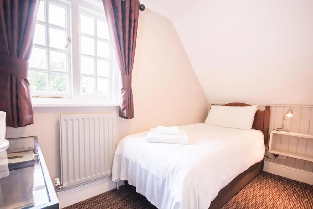 Bed in The Burley Inn