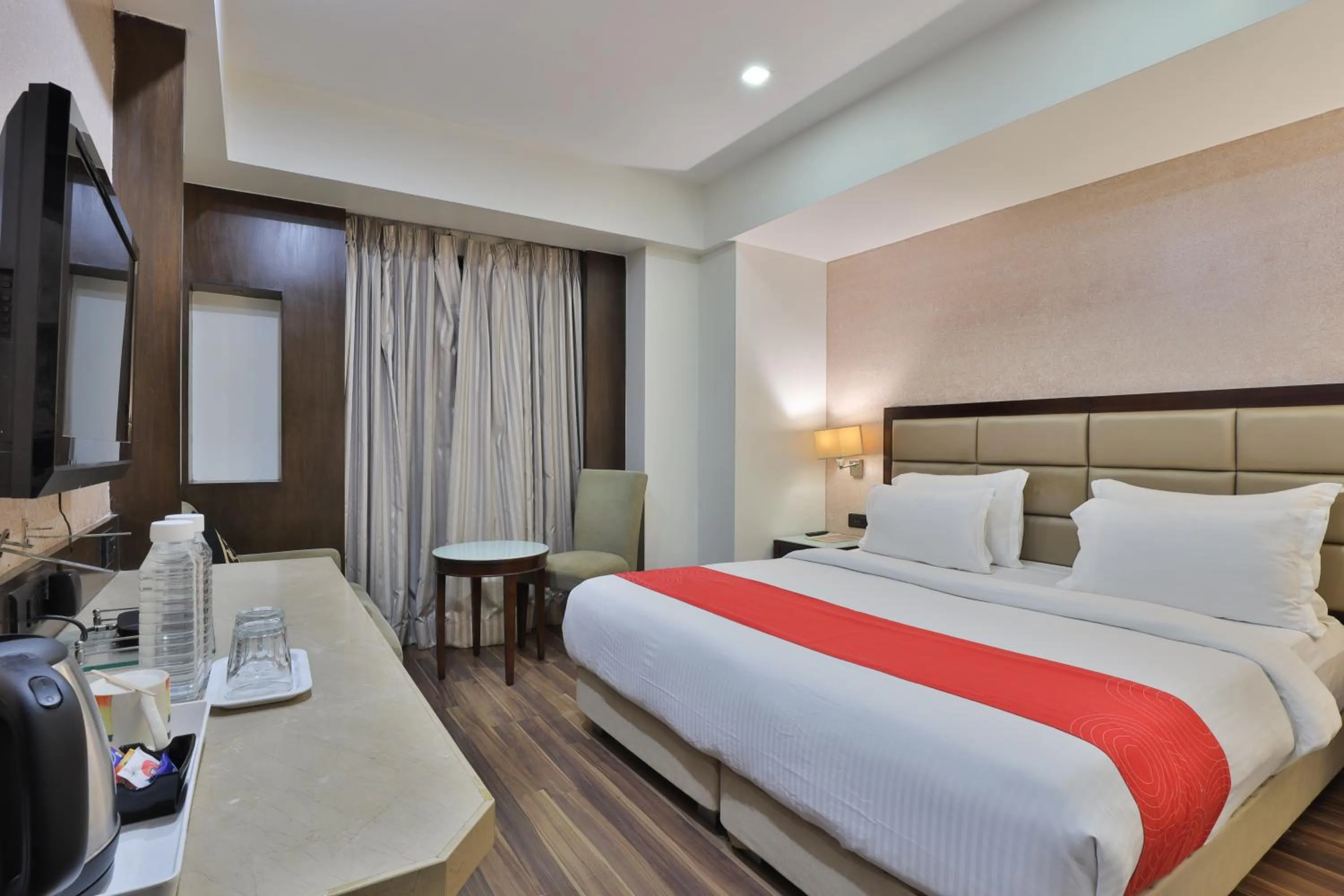 Bedroom, Bed in Krios Hotel - Near SG Highway, Ahmedabad