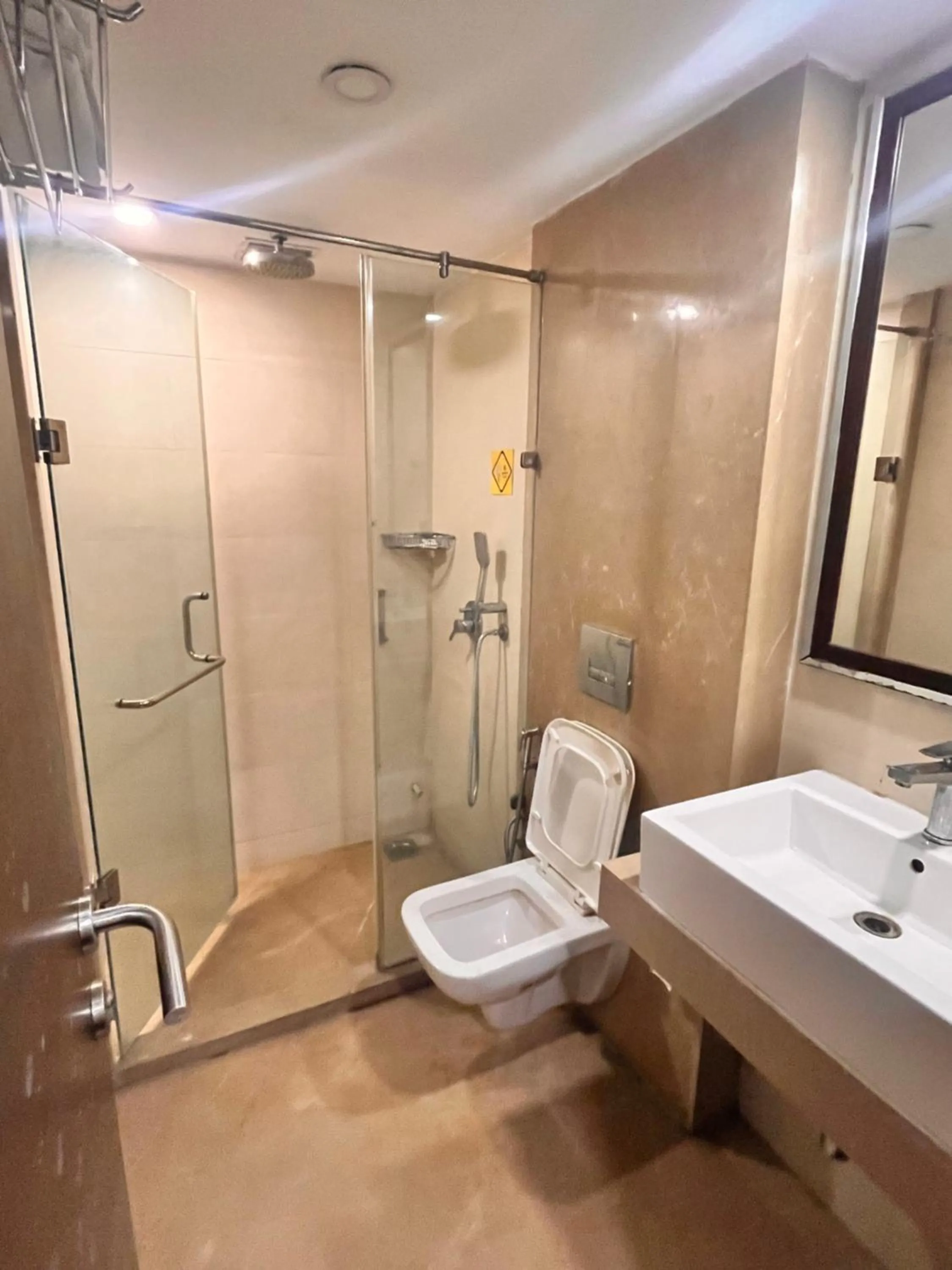 Bathroom in Krios Hotel - Near SG Highway, Ahmedabad