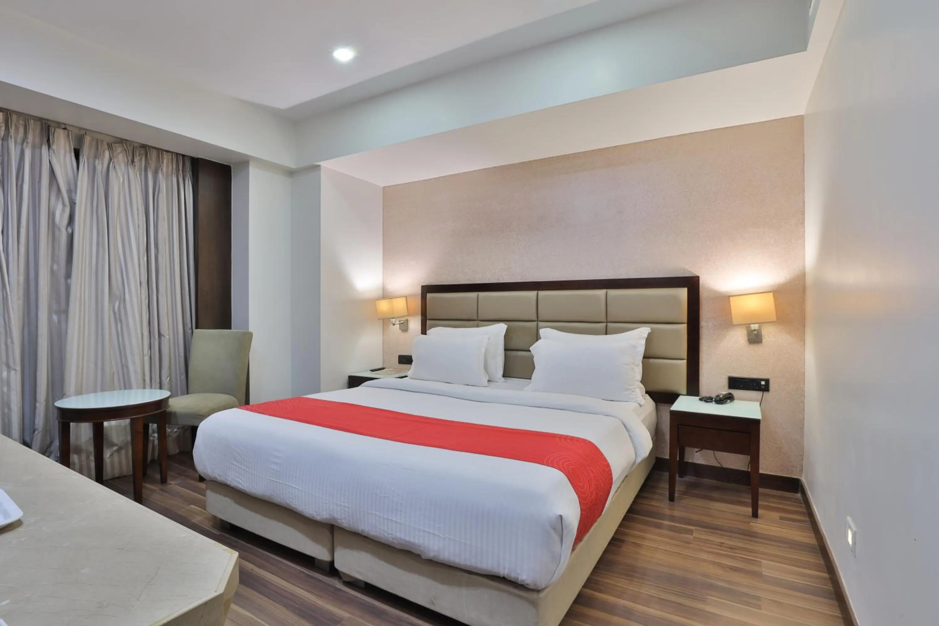 Bedroom, Bed in Krios Hotel - Near SG Highway, Ahmedabad